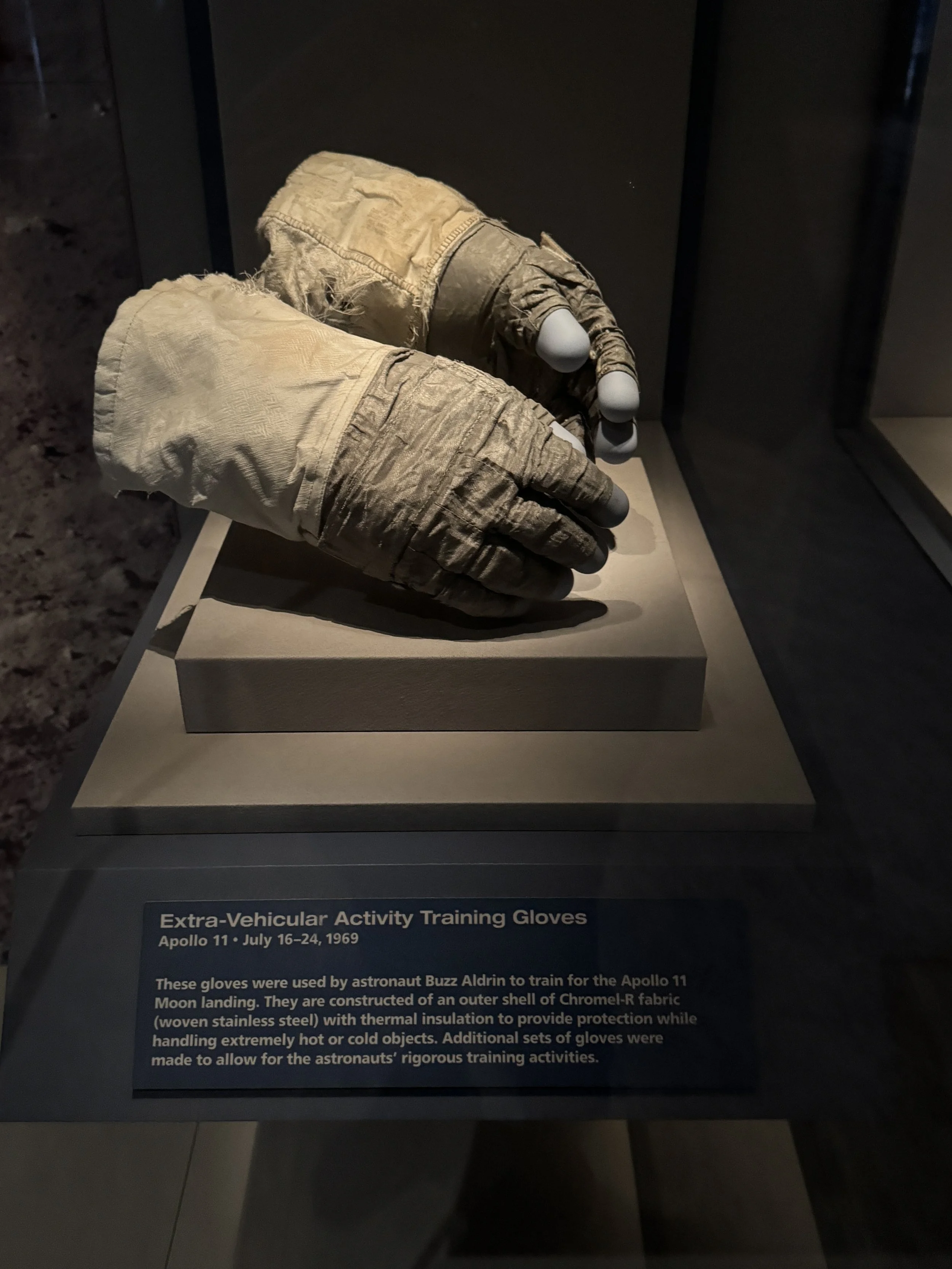 Apollo astronaut gloves used during lunar missions on display at Kennedy Space Center.
