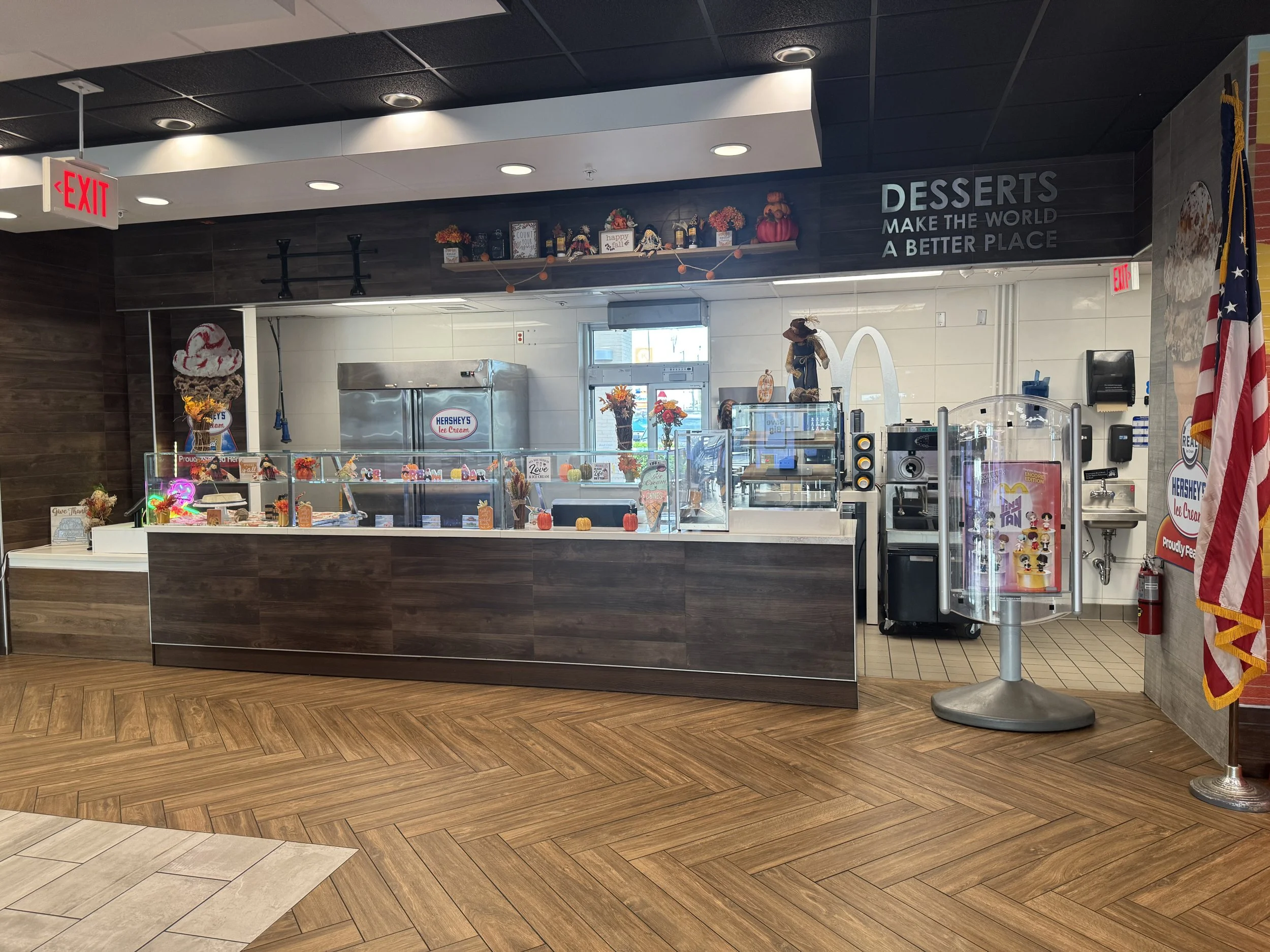 Dessert counter and specialty food area inside the World's Largest Entertainment McDonald's in Orlando.