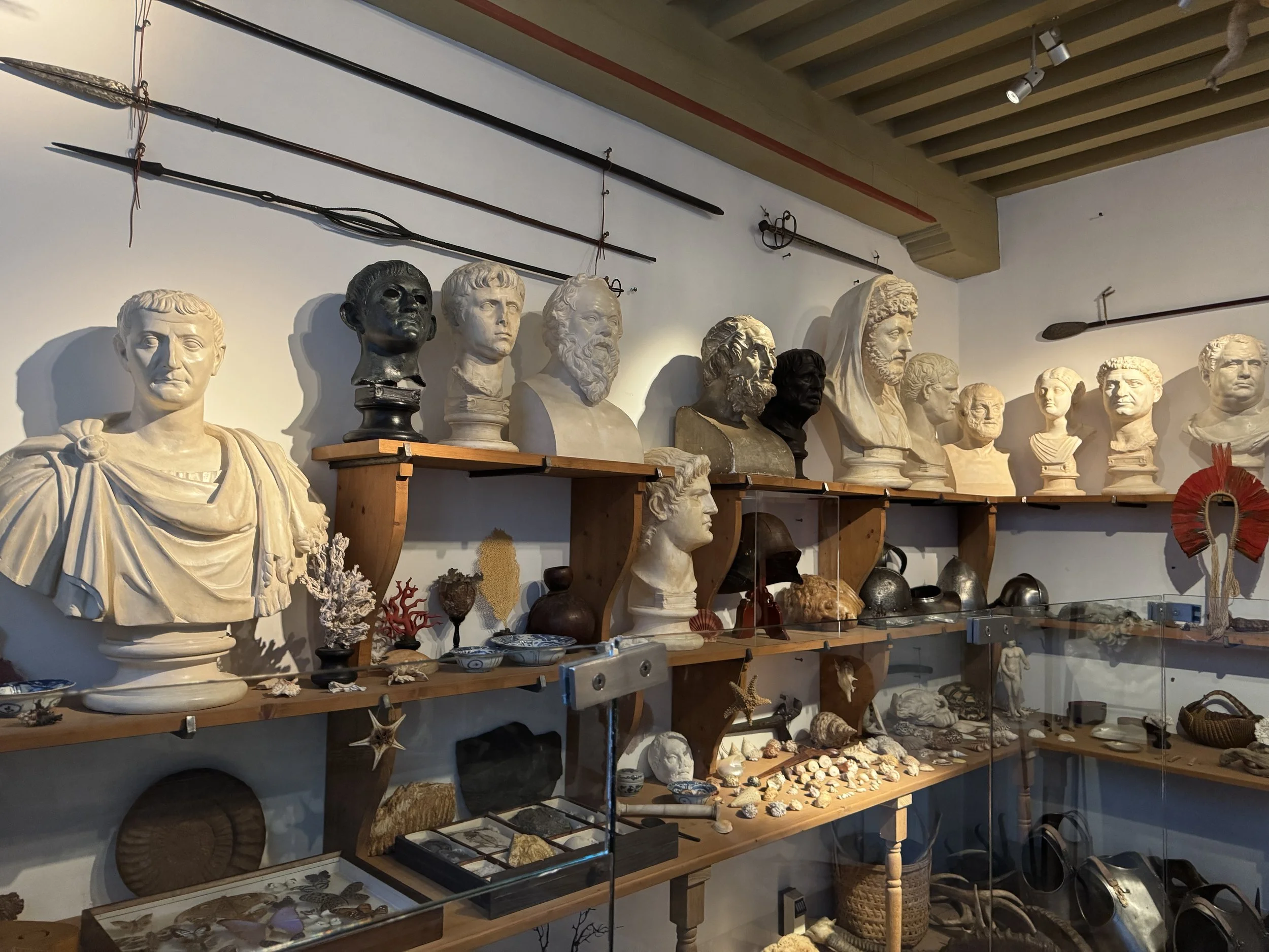 Collection of sculptures, busts, and art materials displayed at Rembrandt House Museum in Amsterdam