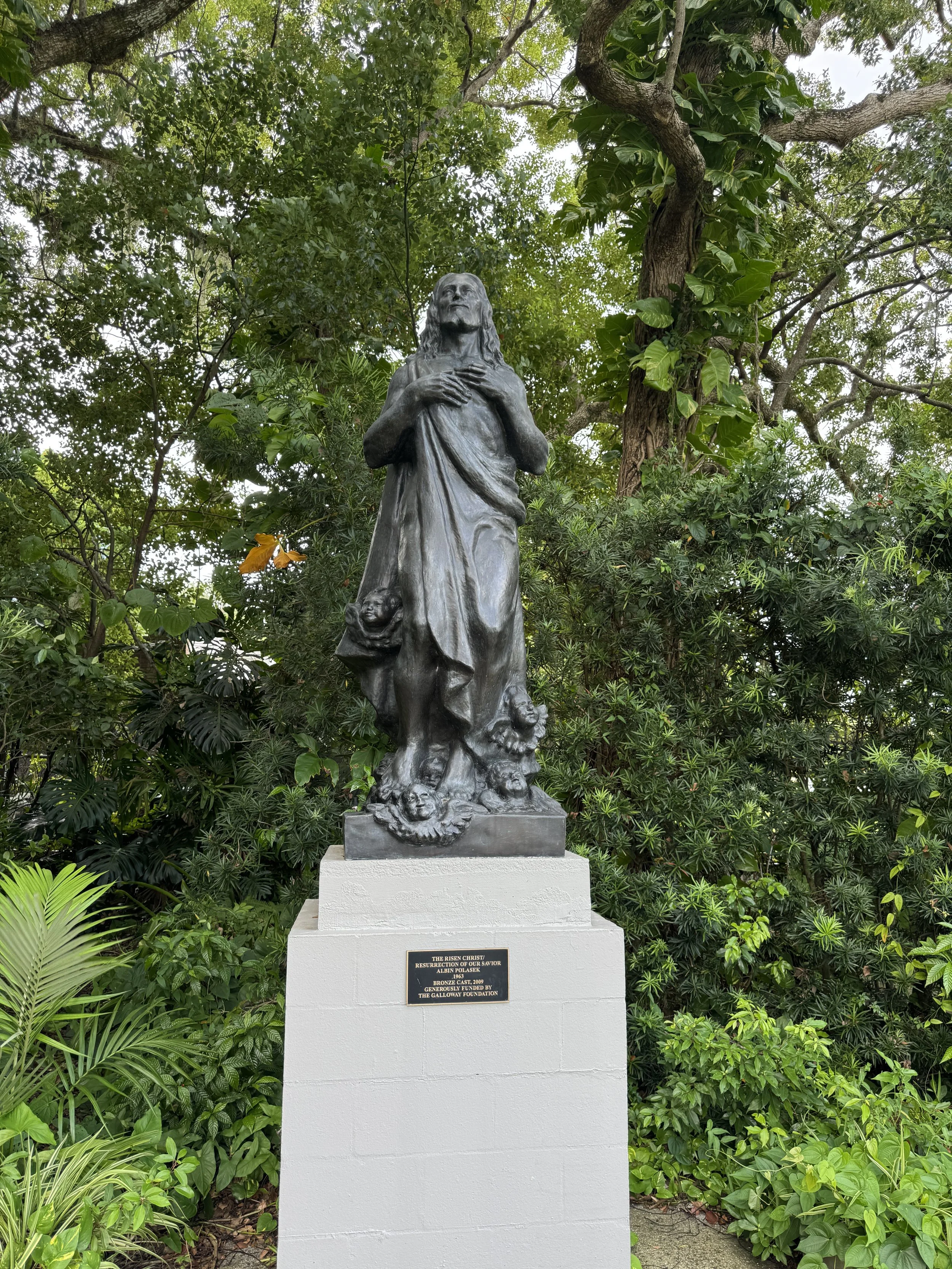 Outdoor statue surrounded by greenery at the Albin Polasek Museum & Sculpture Gardens in Winter Park.