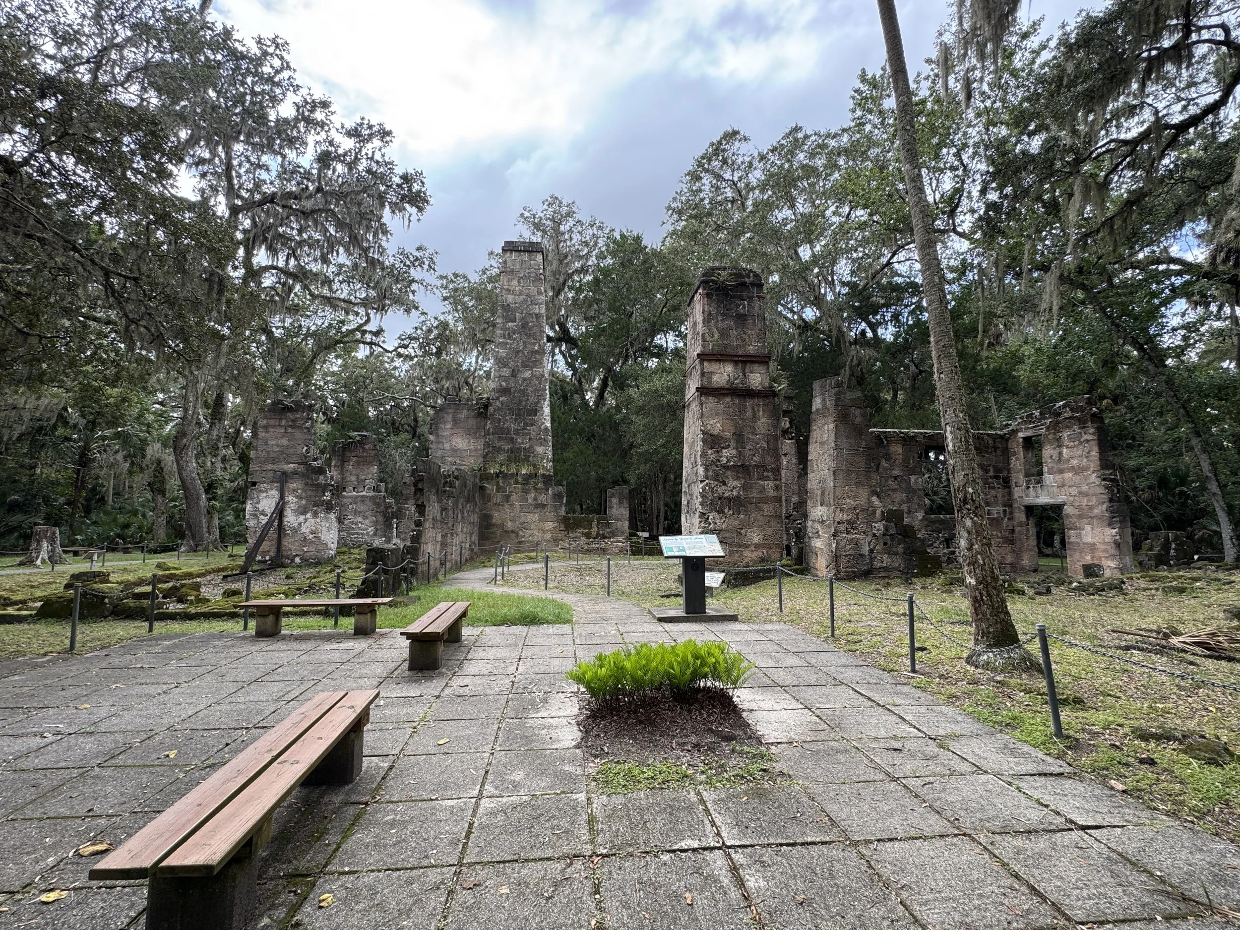 View of the preserved plantation ruins and courtyard area at Bulow Plantation Ruins Historic State Park in Florida.