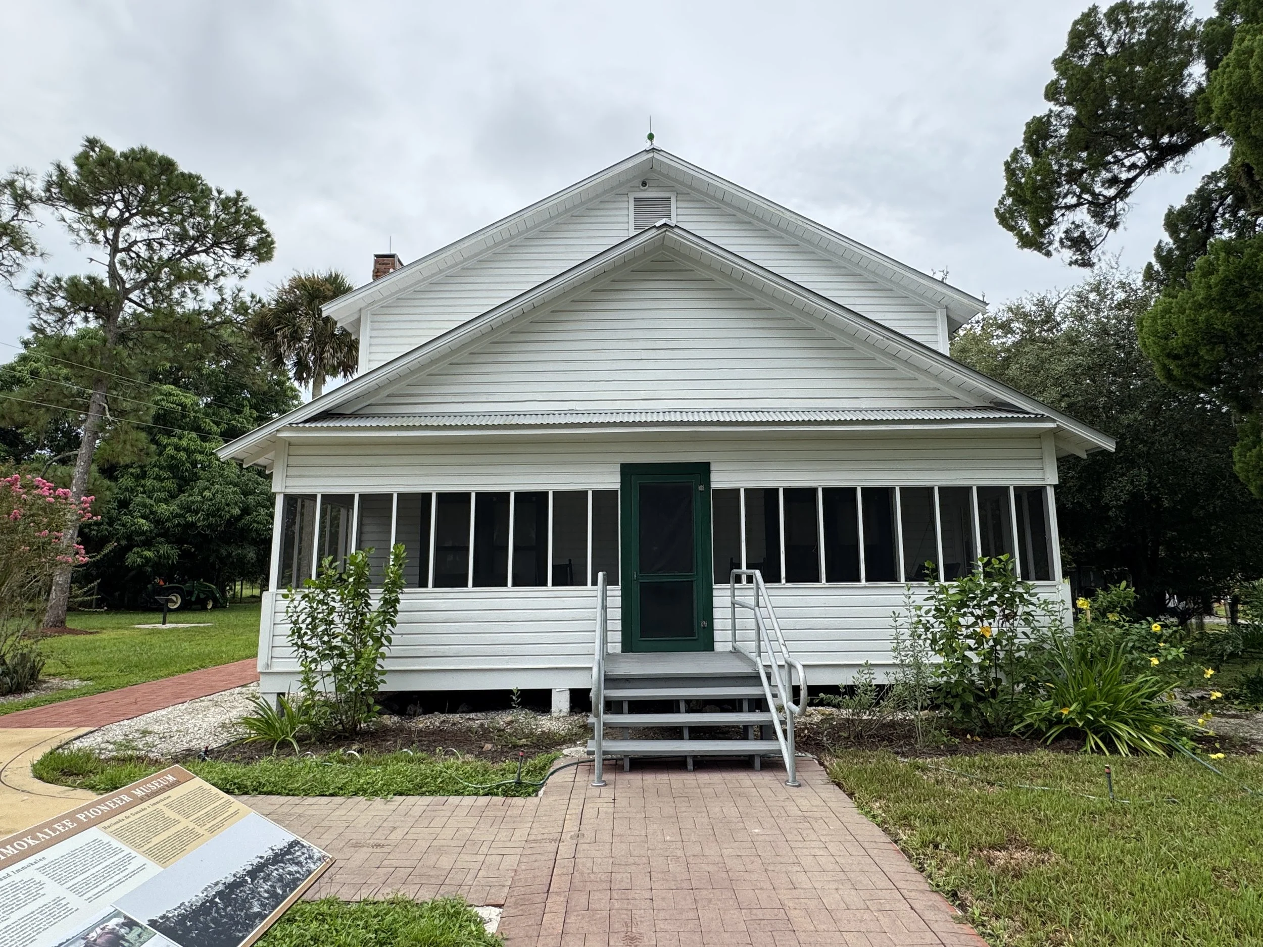 Historic white building at Immokalee Pioneer Museum on Roberts Ranch, an early settlement site in Southwest Florida.