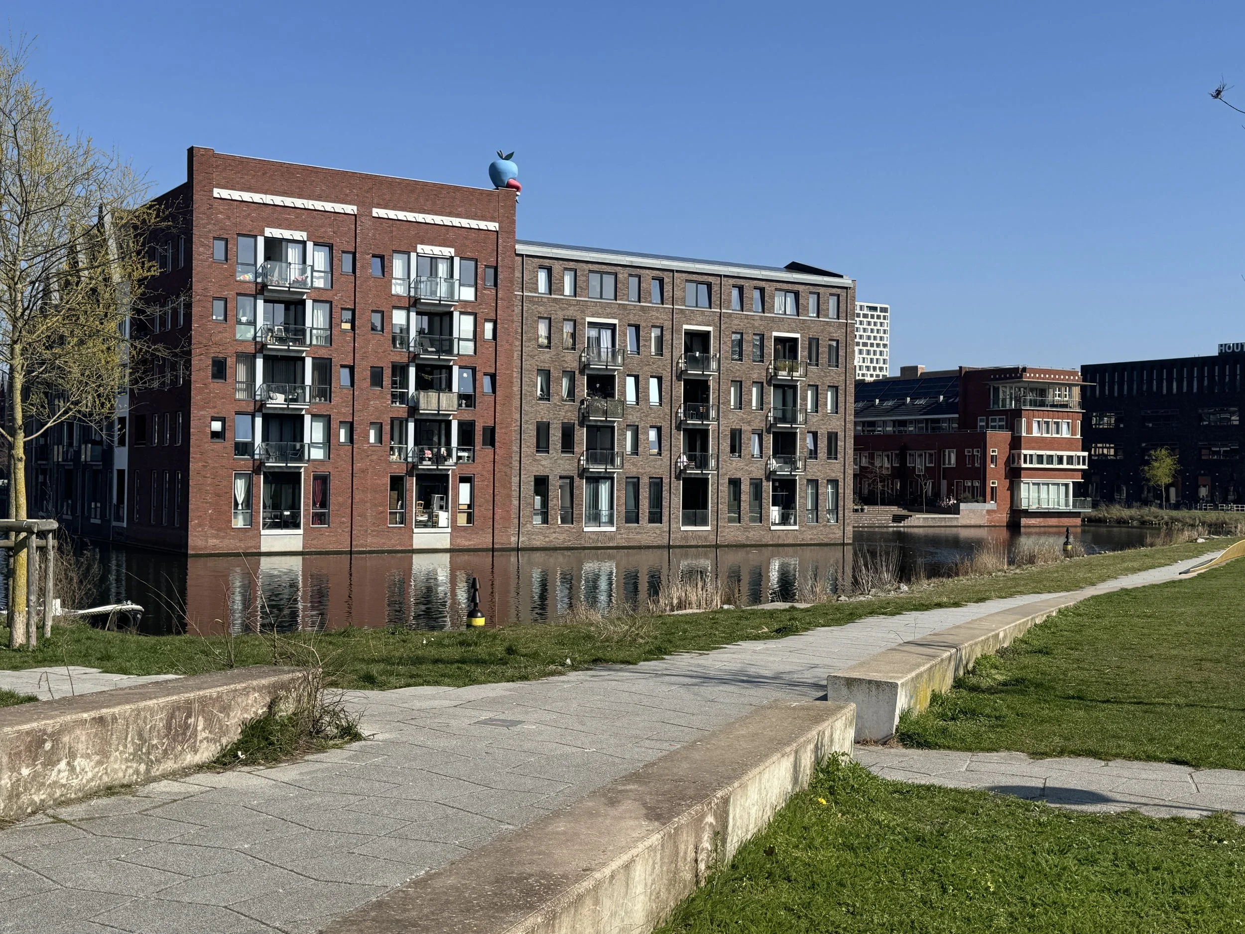 Brick residential buildings near Museum Het Schip in Amsterdam showcasing Amsterdam School architecture