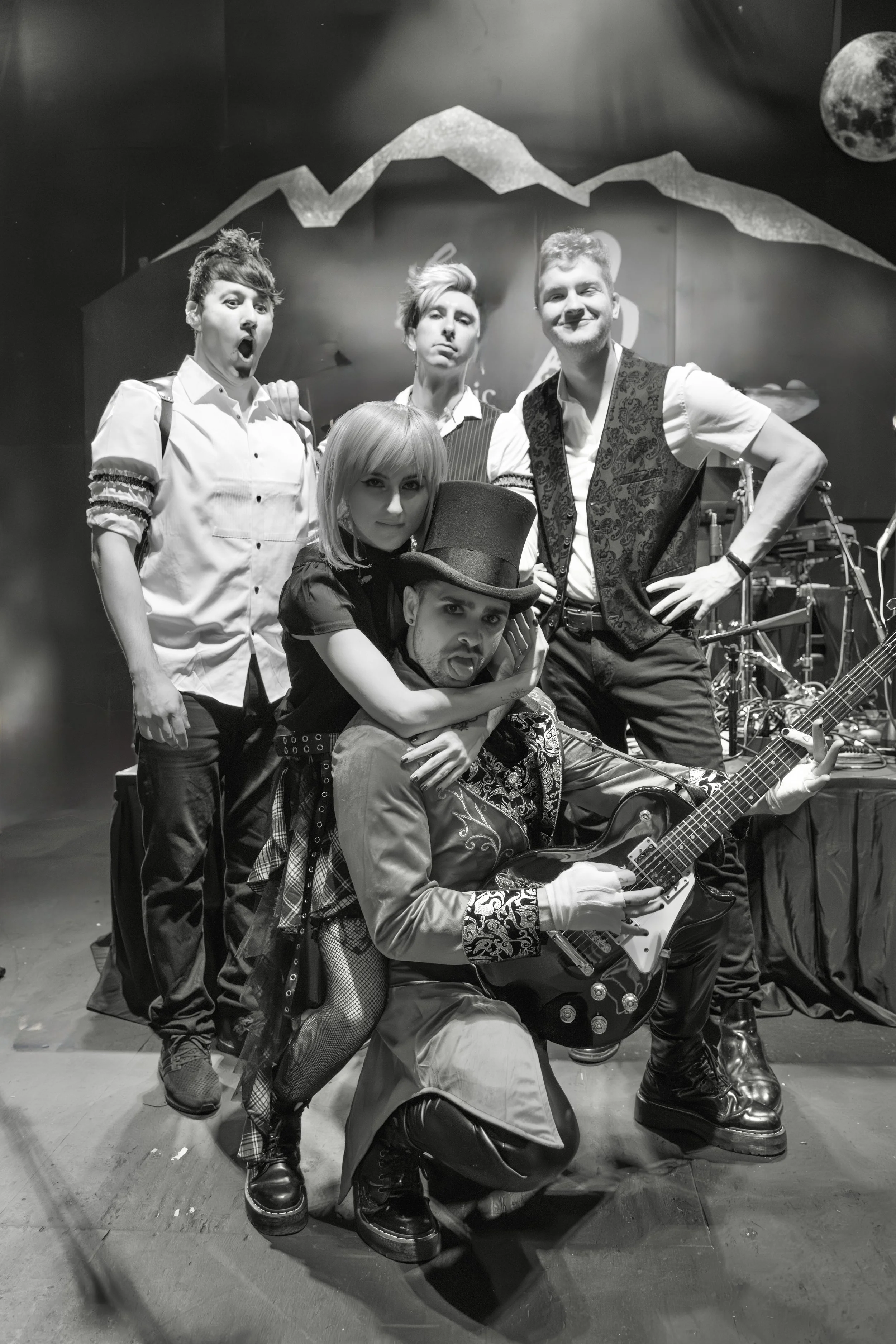 A black and white image of the band members from Paramore! At the Disco