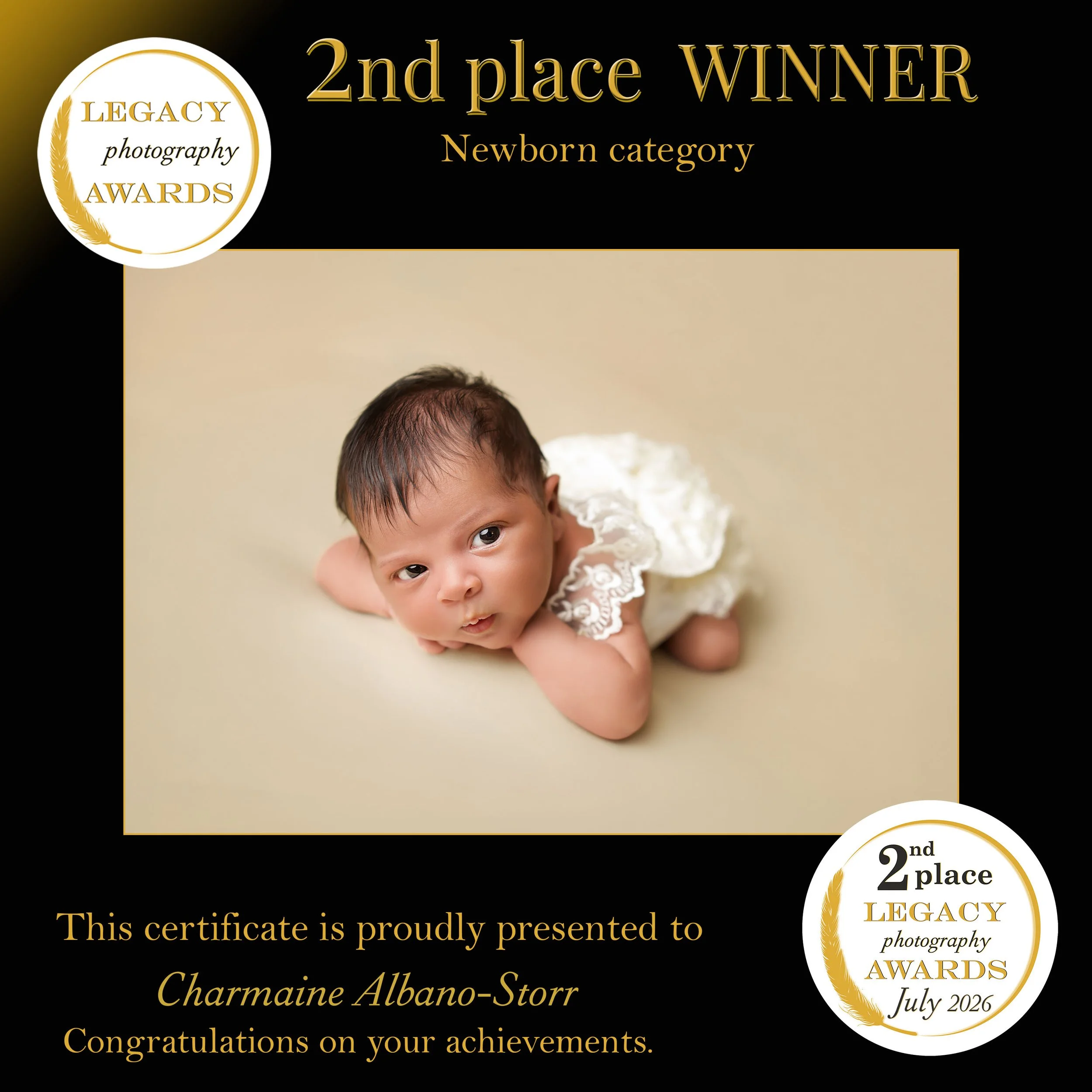 2nd place winner in the Legacy Photography Awards Newborn category, featuring an awake newborn baby posed on a soft neutral background.