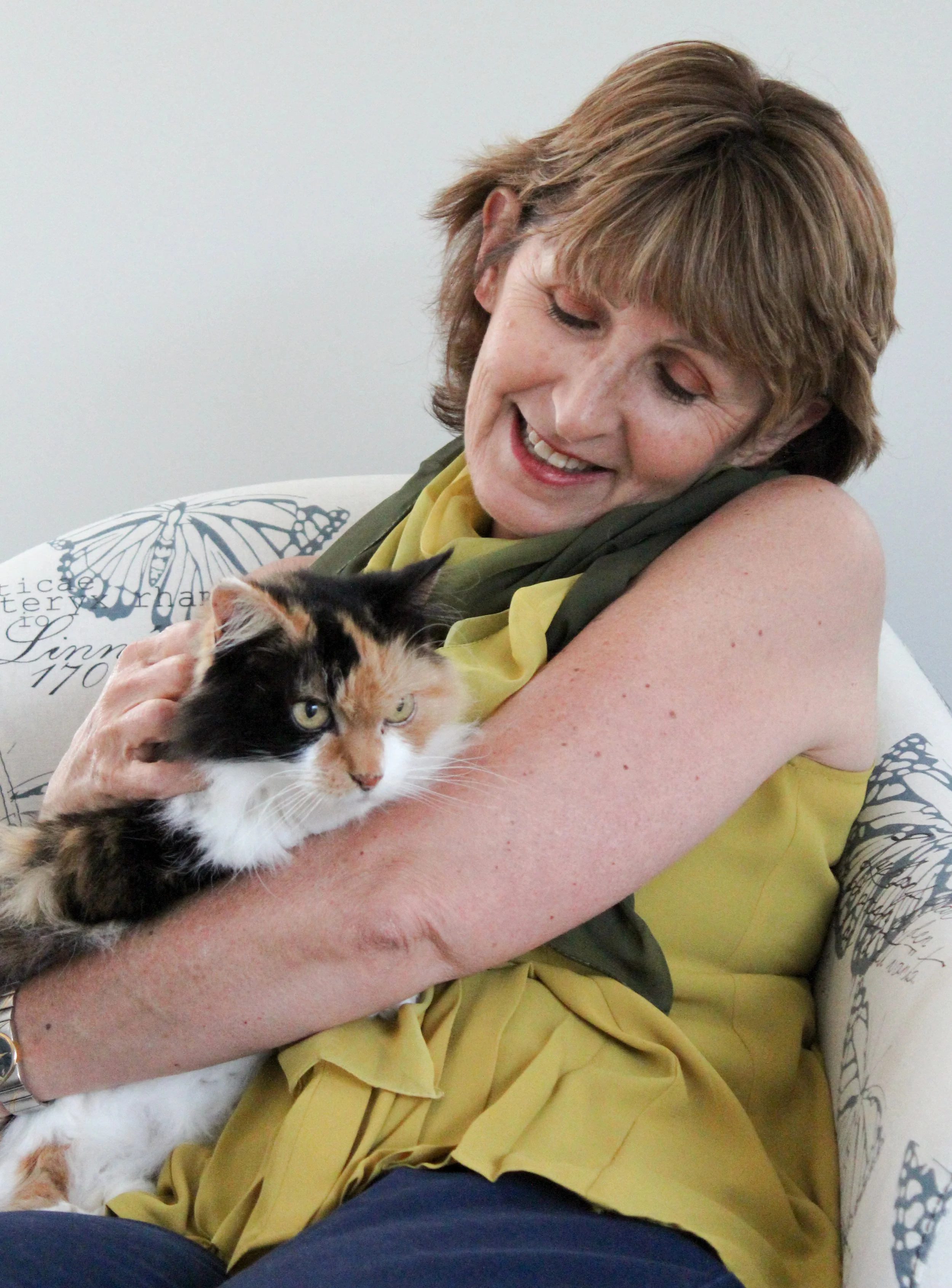 Deborah, Animal Whispers NZ, with her cat Molly.
