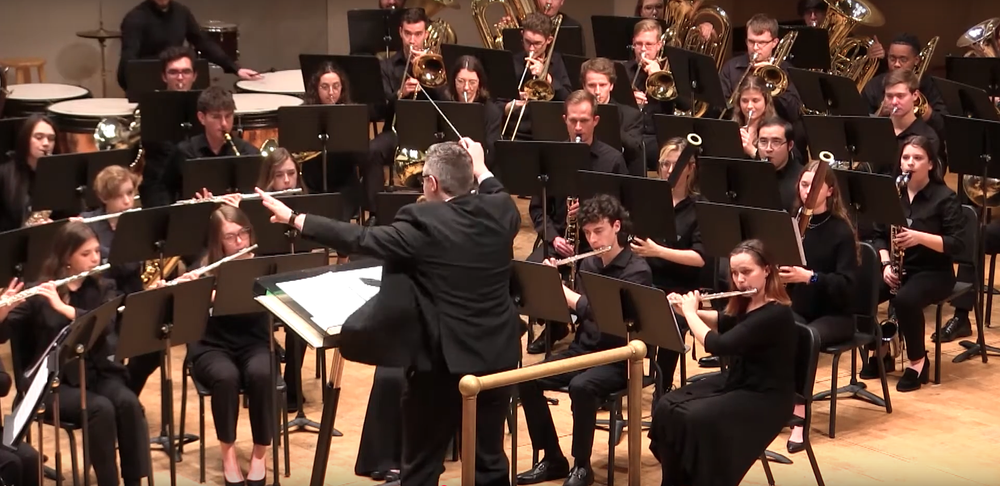Russell Greene conducting a concert ensemble