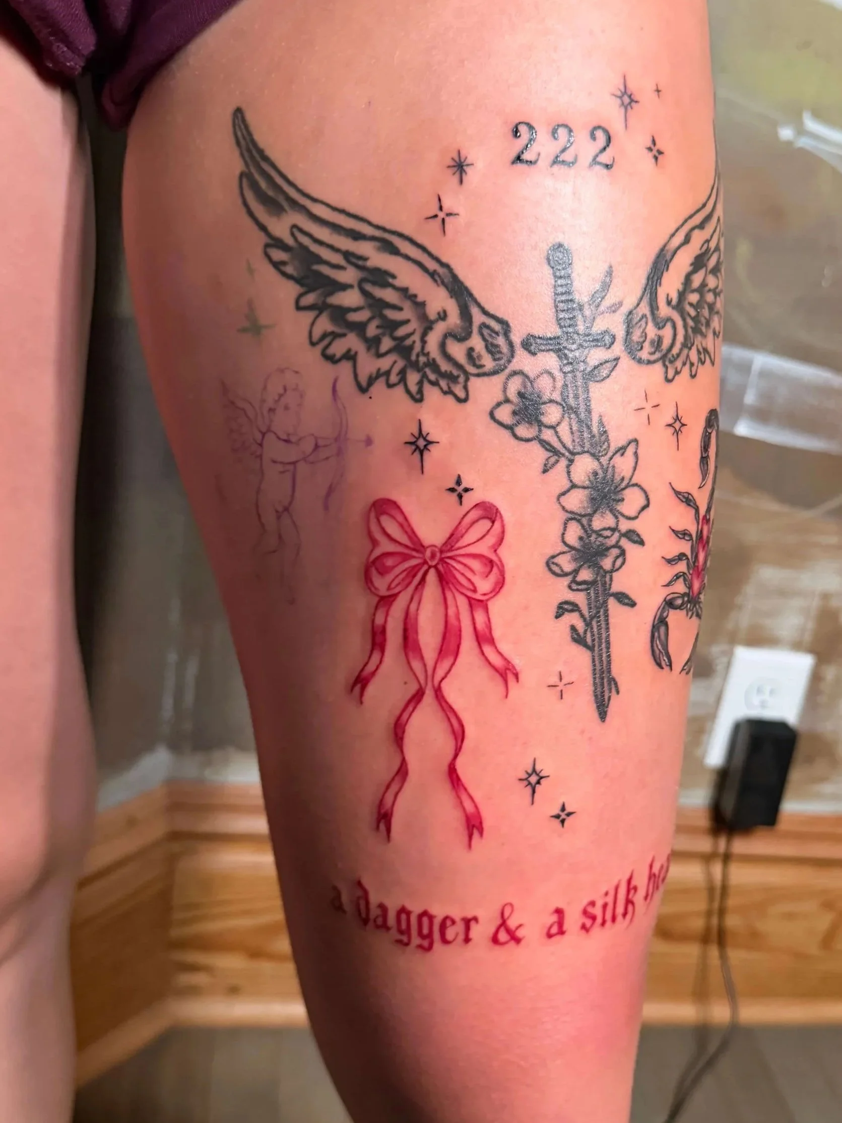 all done by me except the sword with wings and floral. 