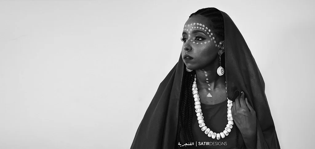 Staged portrait exploring Sudanese identity, Arab and African narratives, and cultural hierarchy — Dominance series by Enas Sati
