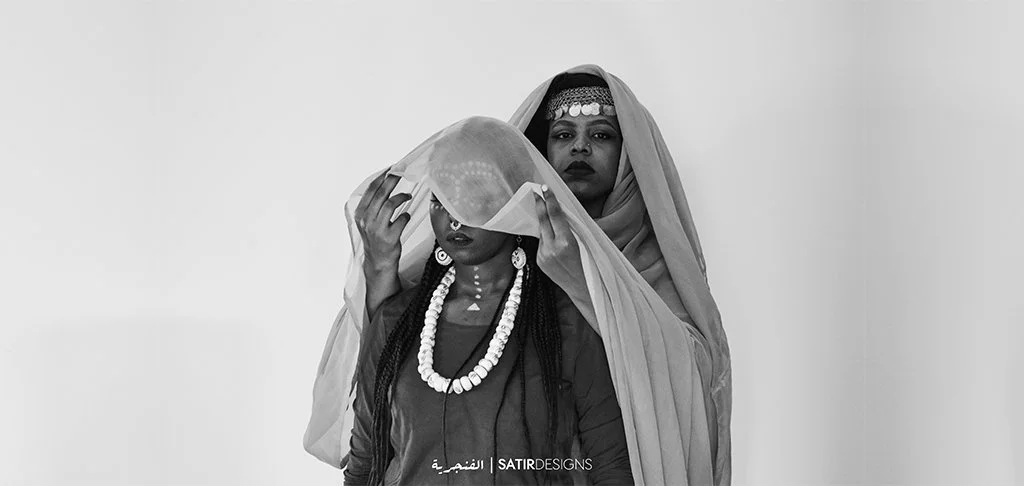Black and white portrait of Sudanese subject examining identity and belonging in the Dominance photographic series by Enas Satir