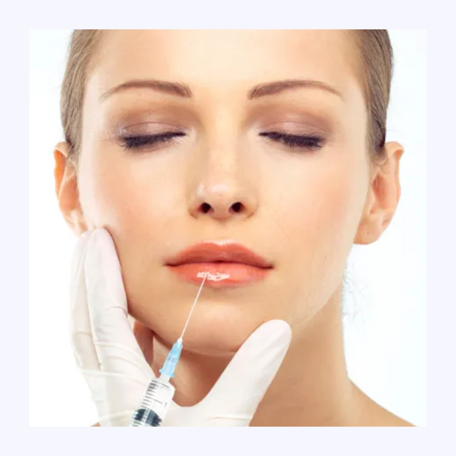 A woman with closed eyes receives a cosmetic injection in her lips from a healthcare professional wearing gloves.
