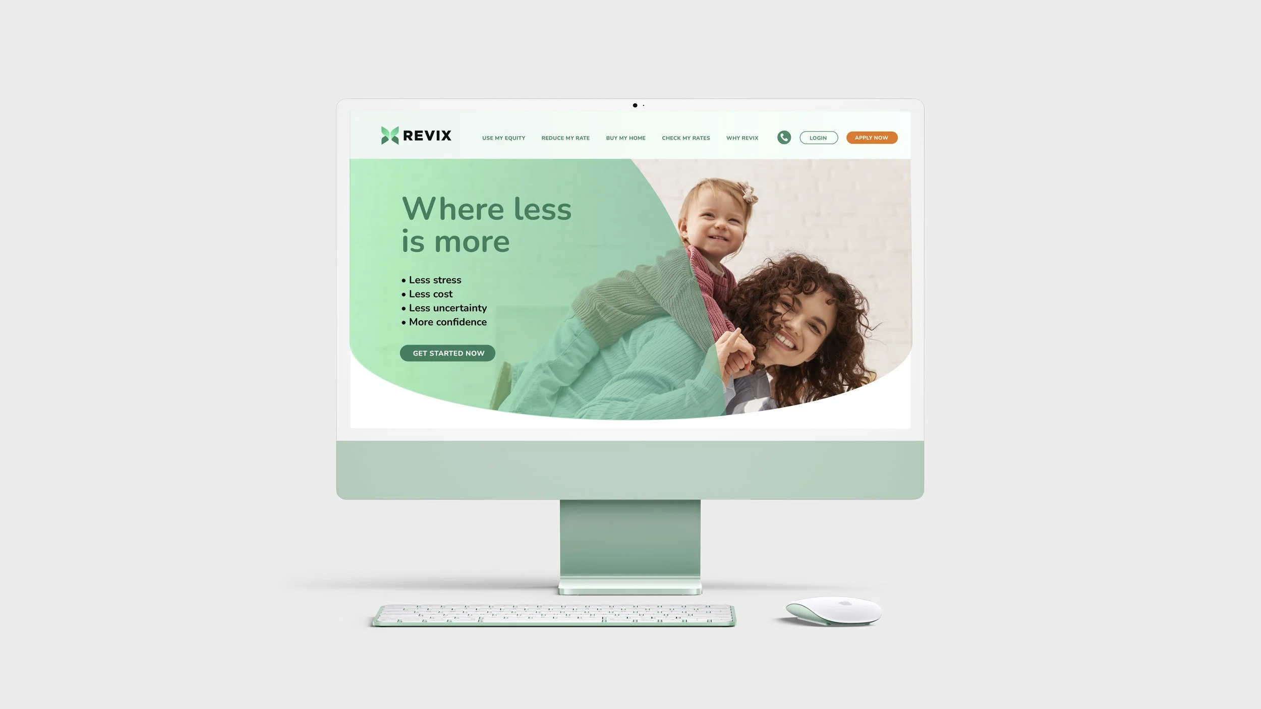 A computer monitor displays a website with a family image, green and white color scheme, and text promoting less stress, less cost, less uncertainty, and more confidence.