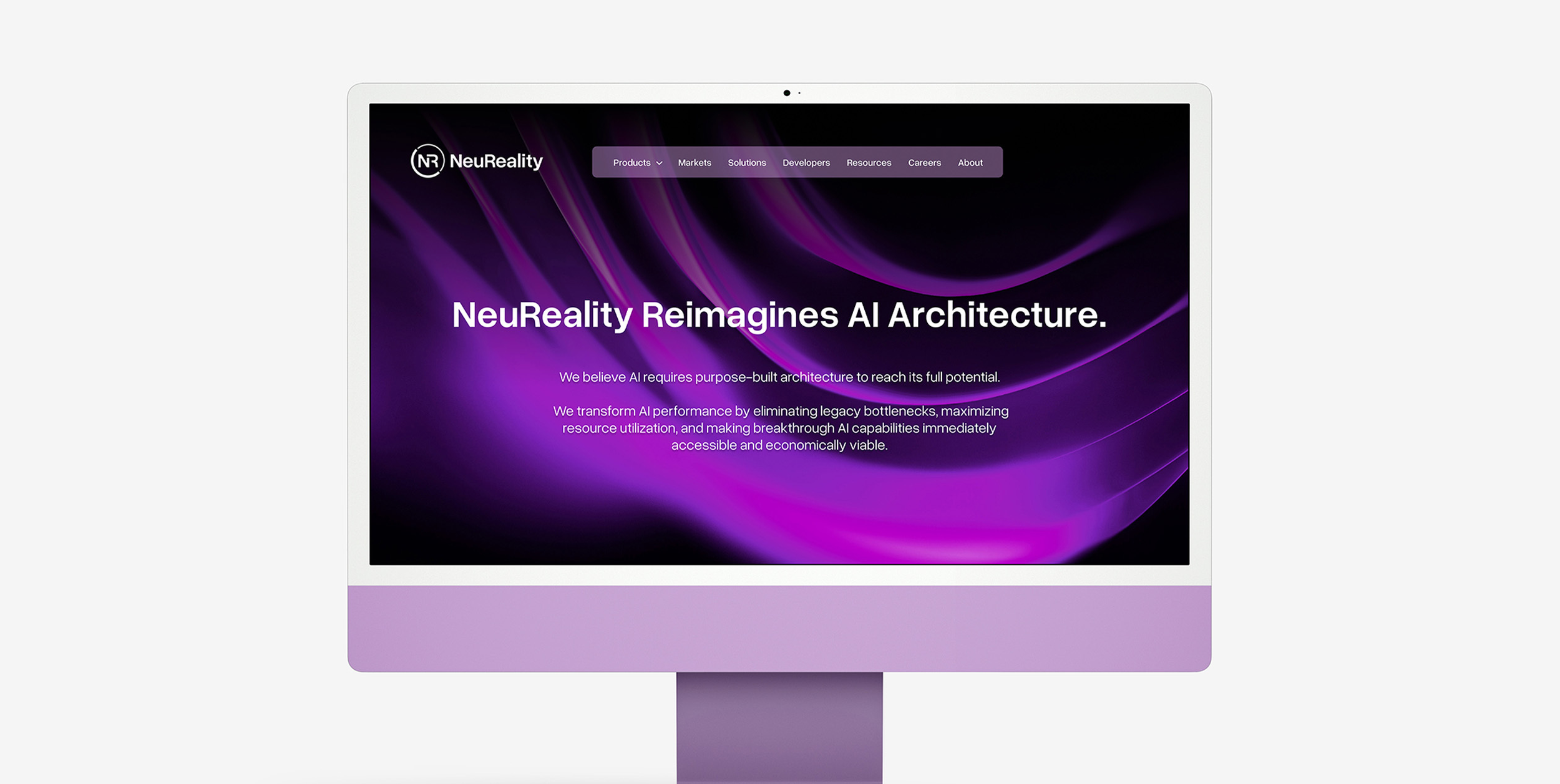 Computer screen displaying the NeuReality website with a purple and black abstract background and navigation menu.