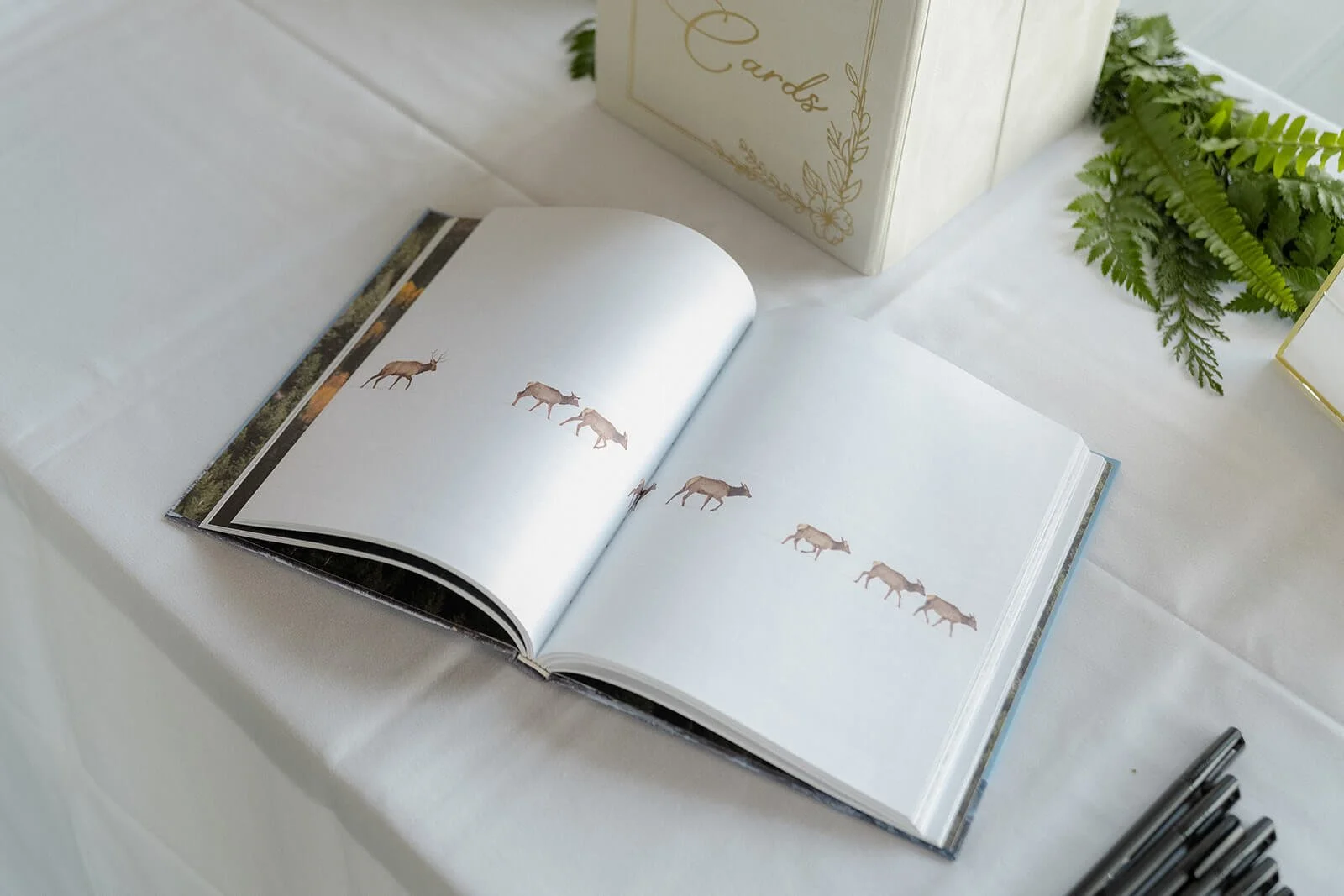 utah-welcome-table-utah-wedding-guestbook-table-greenery.jpg