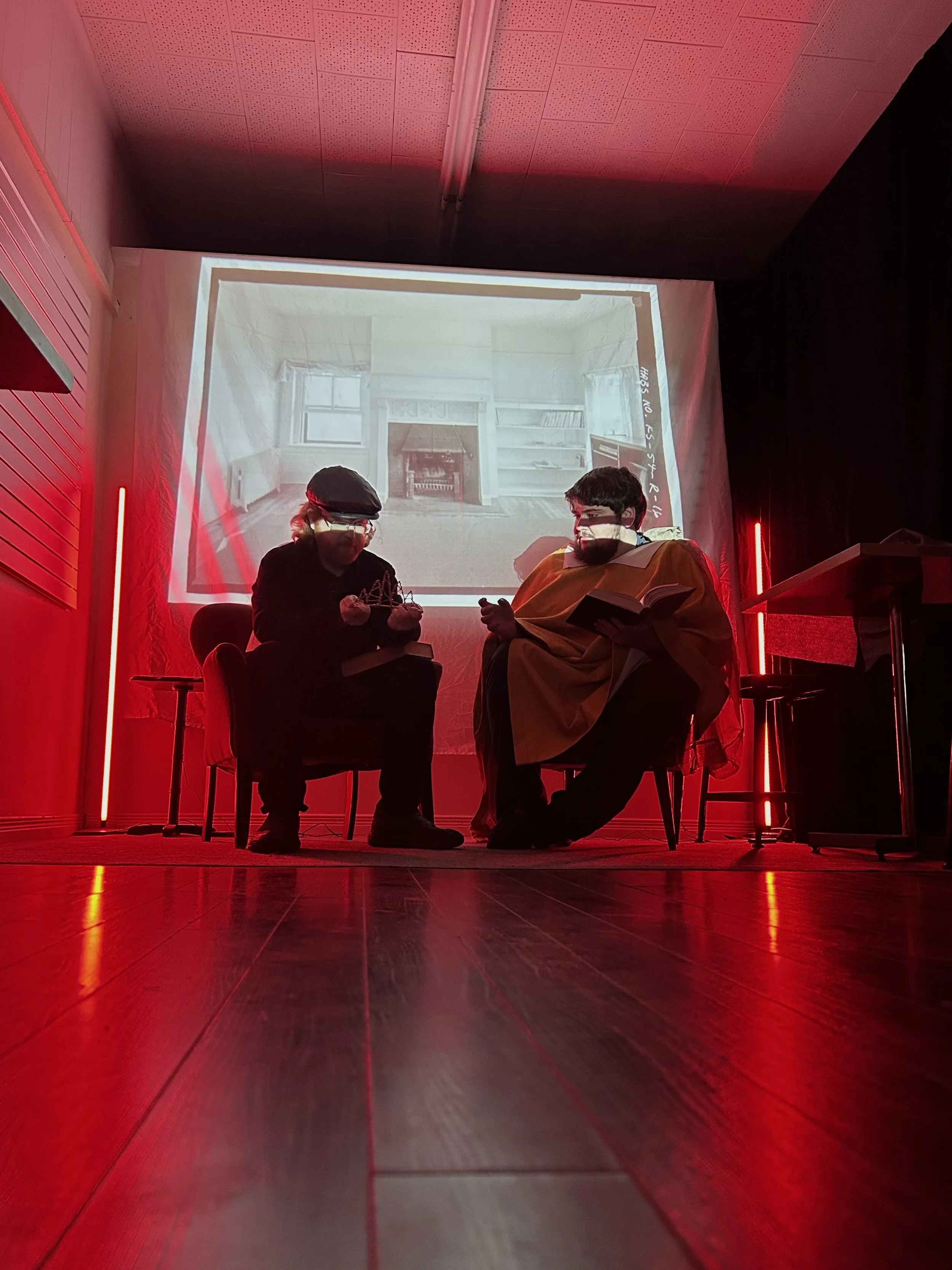 Darlow and Belanger as Castaigne and Wilde