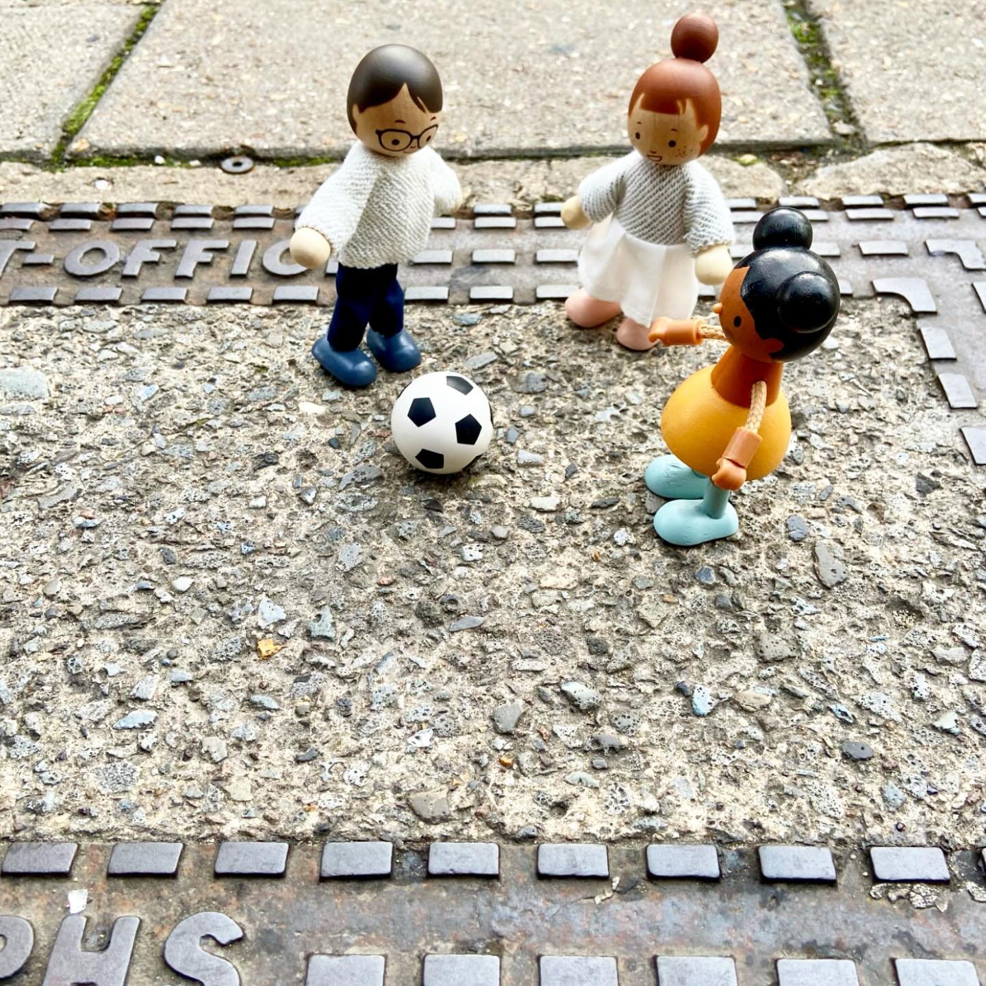 Children learn to share, understand social cues and to experience and resolve conflicts Children learn to share, understand social cues and to experience and resolve conflicts ⚽️

IMAGE DESCRIPTION: The image features a group of toys placed on a side