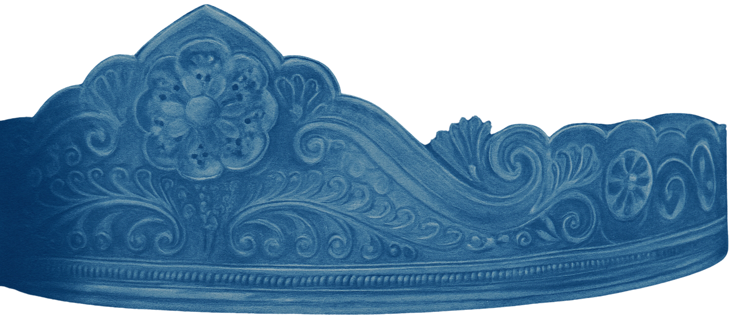 Close-up of a blue decorative architectural element with intricate floral and scroll designs, possibly part of a building facade or crown molding.