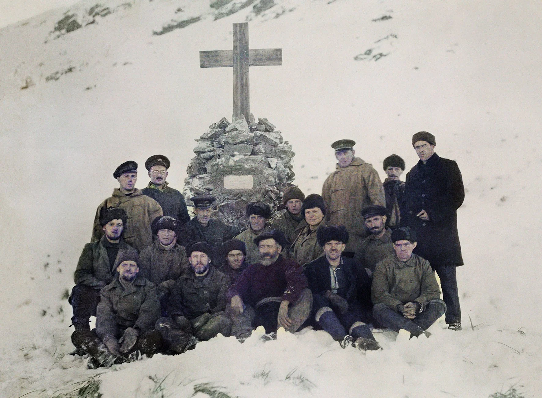 Crew of 'Quest' at Shackleton's cairn, Hope Point, King Edward Cove, South Georgia, 5 May 1922