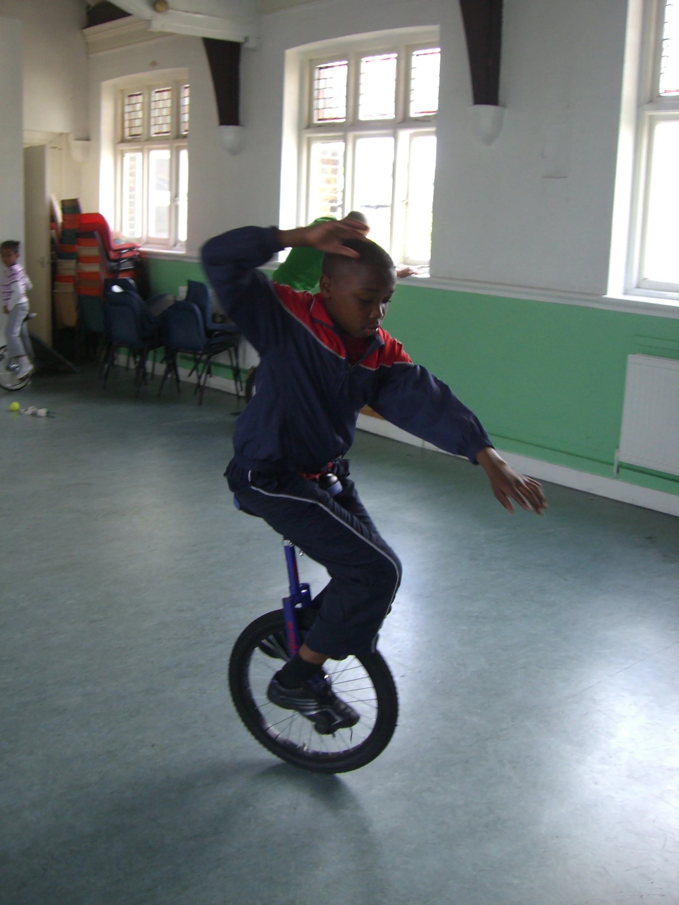 Josh Unicycle 1.JPG