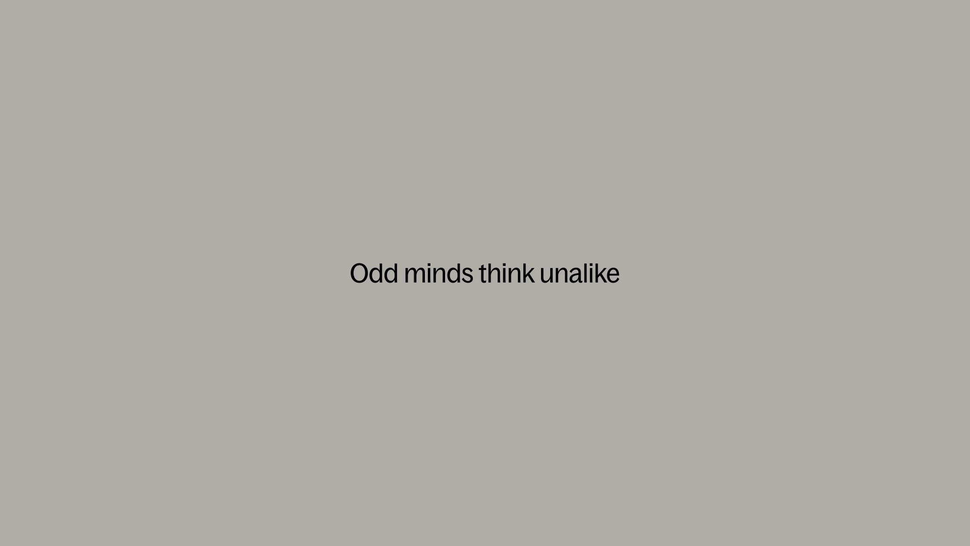 Gray background with black text that says 'Odd minds think unlike'