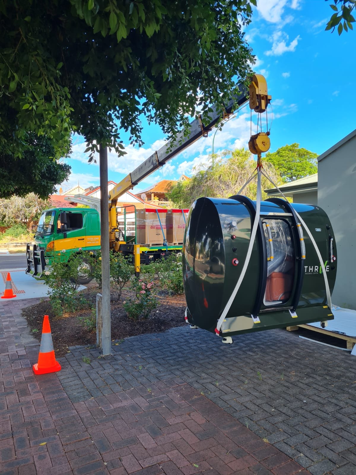 Slew Hiab Serices Perth, crane truck hire, perth health and wellness, thrive wellness clinic, thrive hyperbaric chamber, perth oxygen therapy
Green and Gold Hiab Hire
Wet Hiab Truck Hire