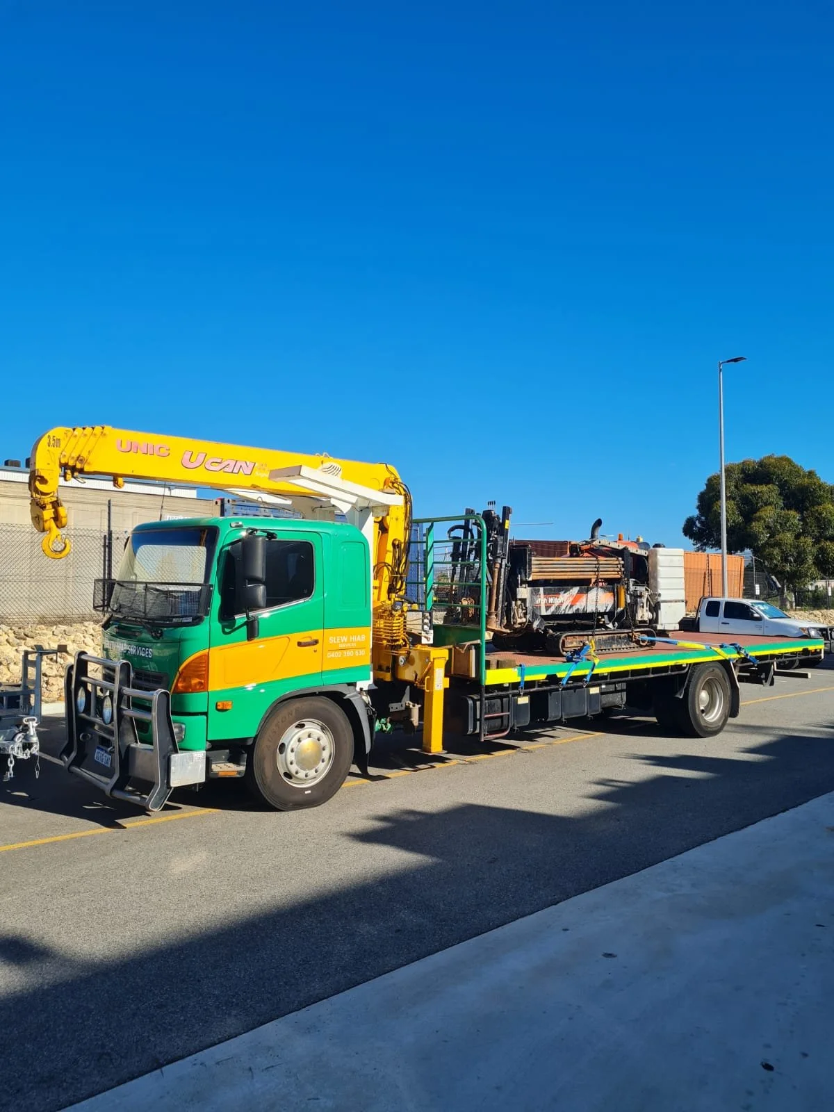 Slew Hiab Serices Perth, crane truck hire, Ditch Witch CEA, Perth directional drill hire, Perth drilling transport, JT10 Ditch Witch
Green and Gold Hiab Hire
Wet Hiab Truck Hire