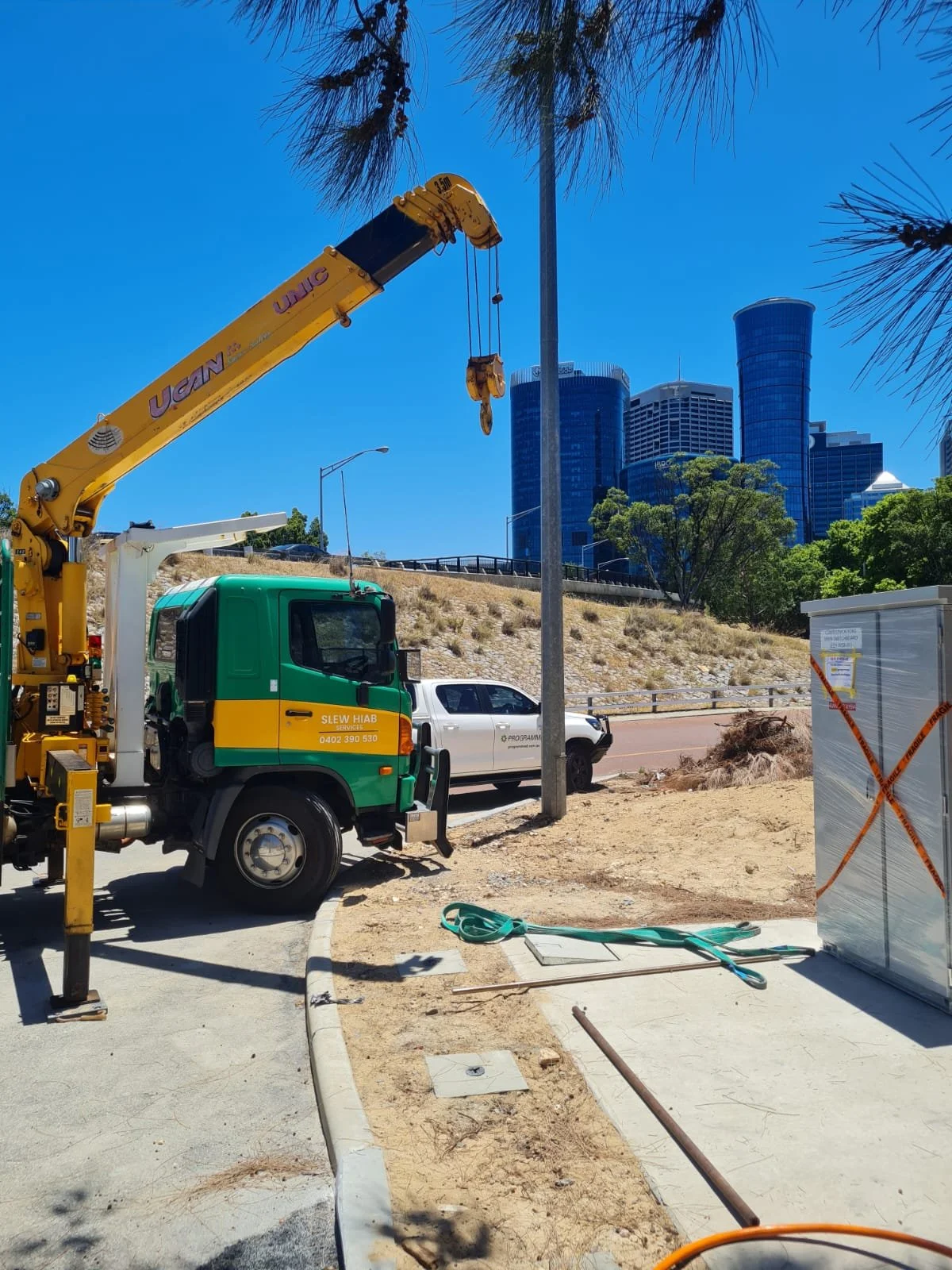 Slew Hiab Serices Perth, crane truck hire, Switchboard transport, perth switchboards, programmed, perth CBD
Green and Gold Hiab Hire
Wet Hiab Truck Hire