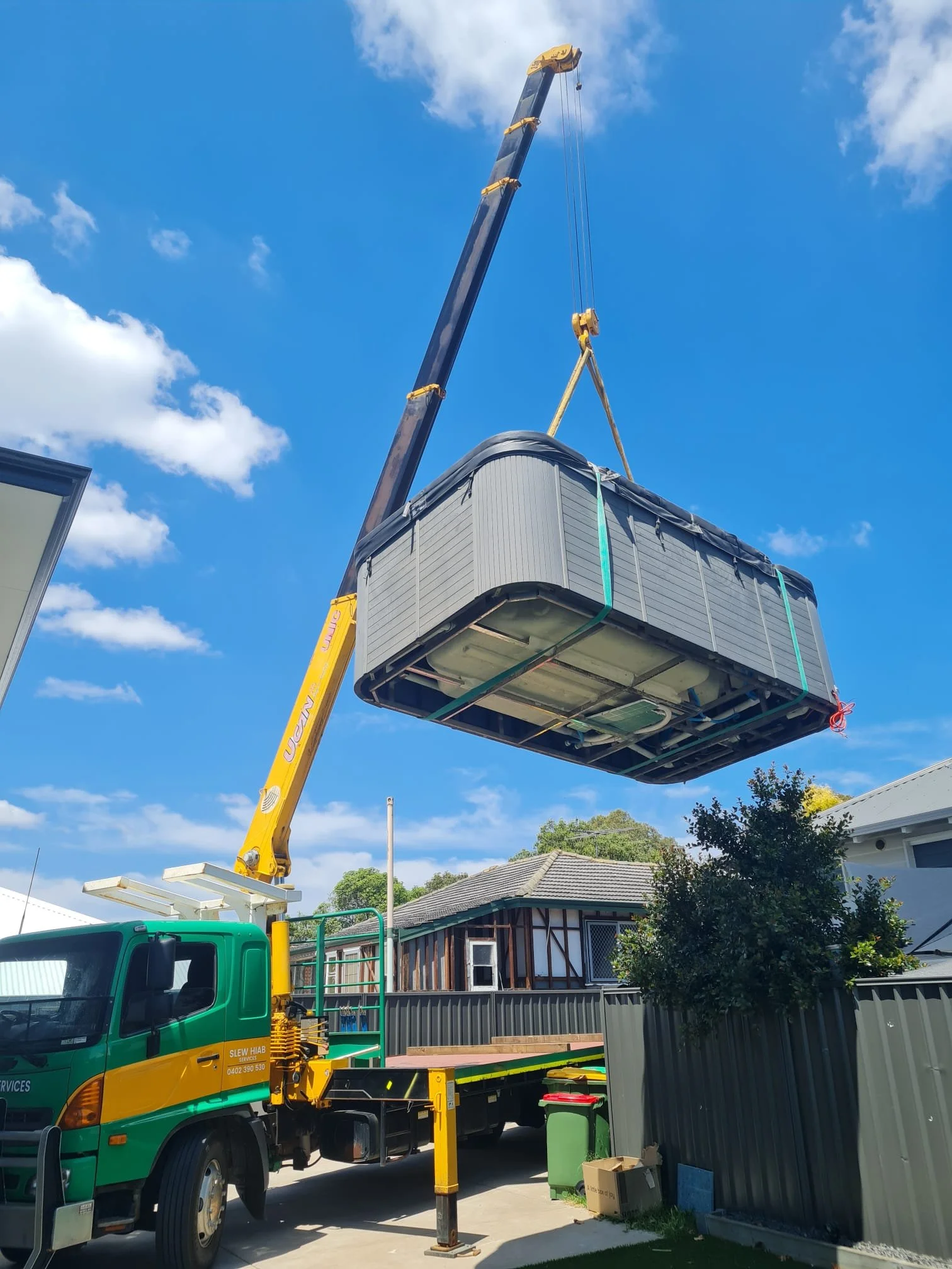 Professional spa relocation and transport services in Perth using our Hiab crane truck for safe lifting, delivery and precise placement of spas and outdoor installations.