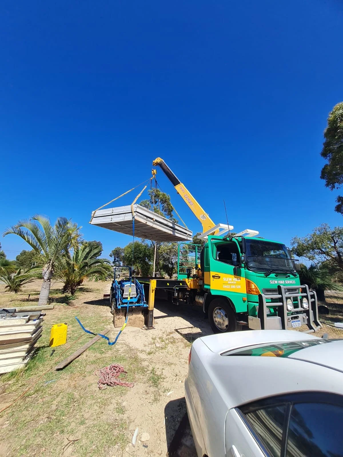 Slew Hiab Serices Perth, crane truck hire, gabbadah, transportable transport, portable buildings perth, portable buildings transport
Green and Gold Hiab Hire
Wet Hiab Truck Hire