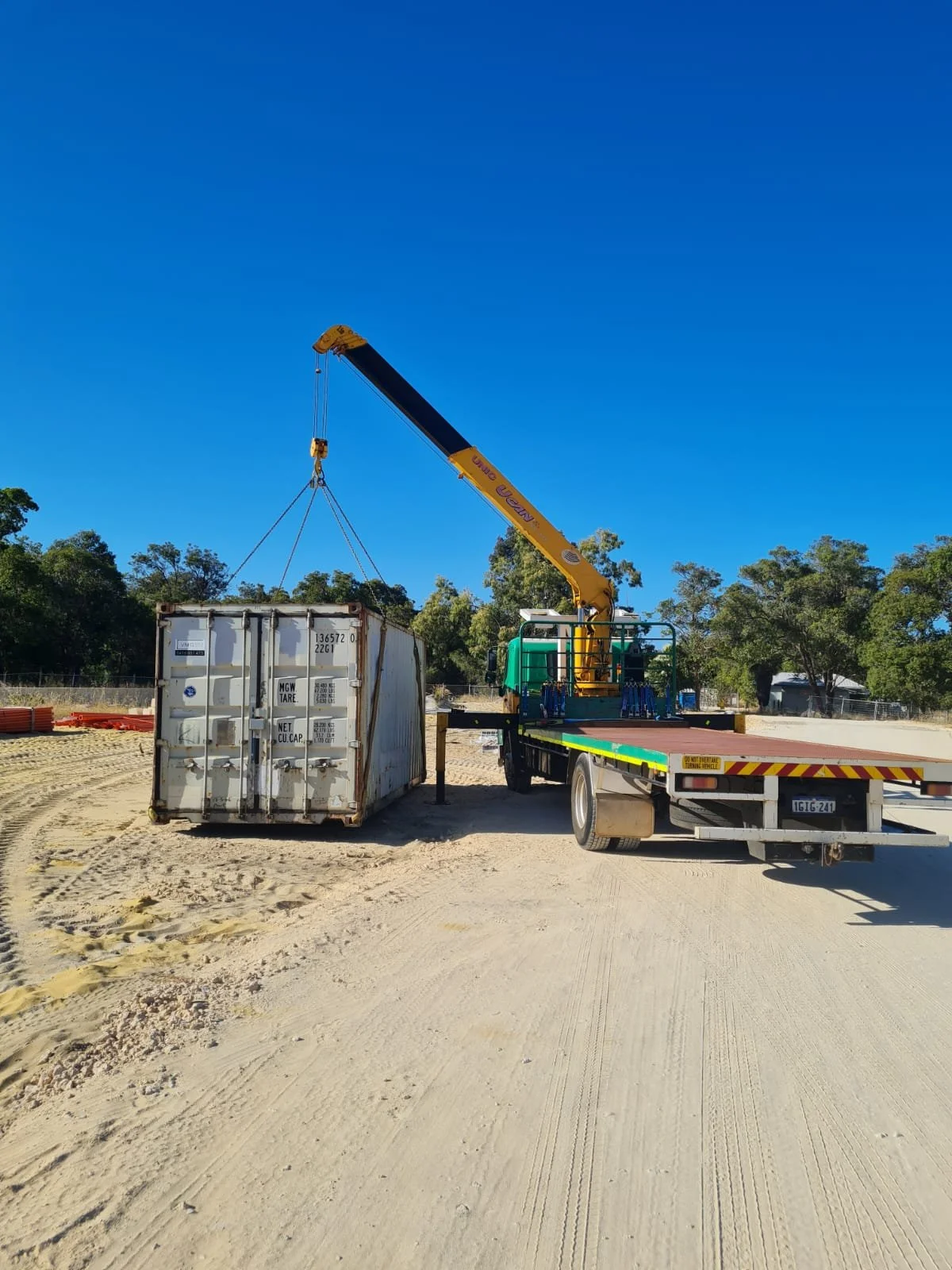 Slew Hiab Serices Perth, crane truck hire, 20ft sea container, sea container transport
Green and Gold Hiab Hire
Wet Hiab Truck Hire