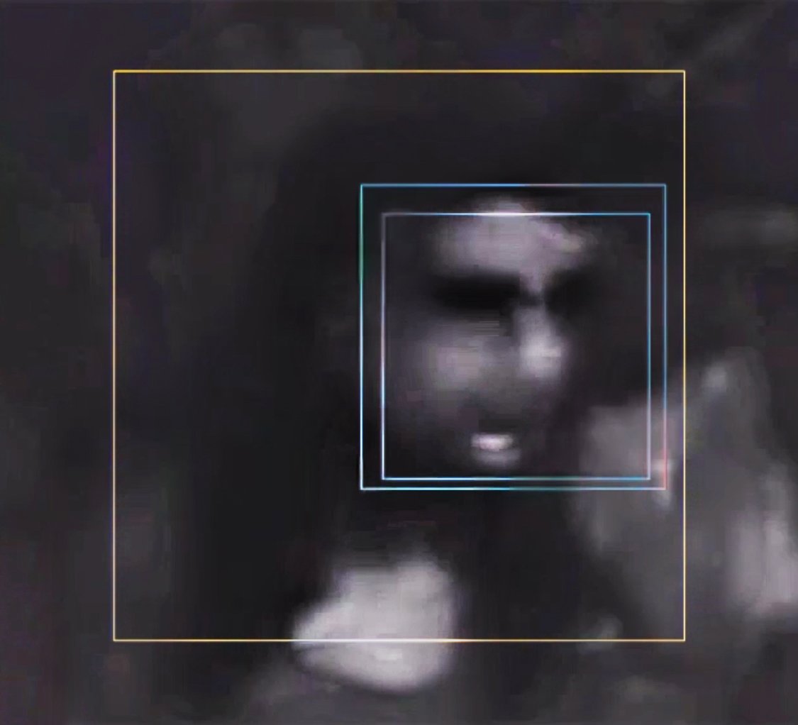 A dark, blurry image of a person's face with closed eyes, surrounded by colorful rectangular frames resembling facial recognition technology. Digital Art. Generative Art. Face detection