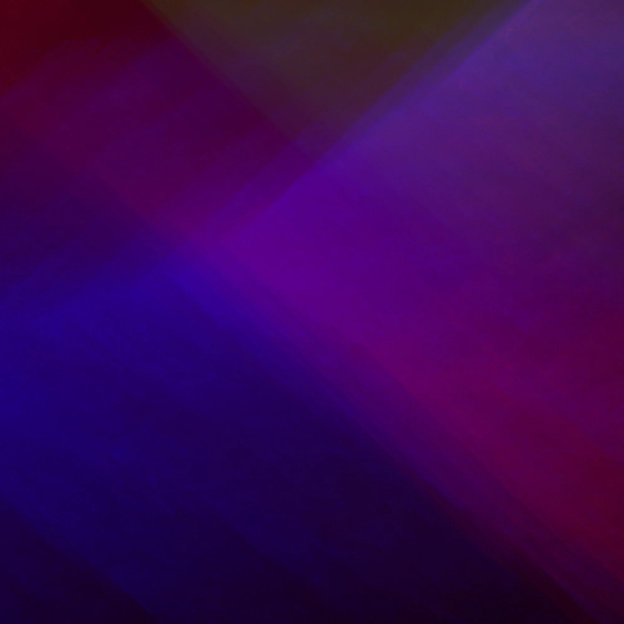 A colorful abstract background with shades of purple, blue, and red blending