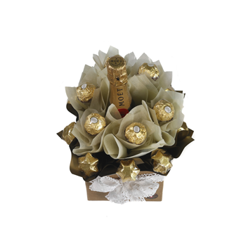Top view of hamper with Ferrero Rocher Champage and chocolate bouquet wrapped in cream and gold papers
