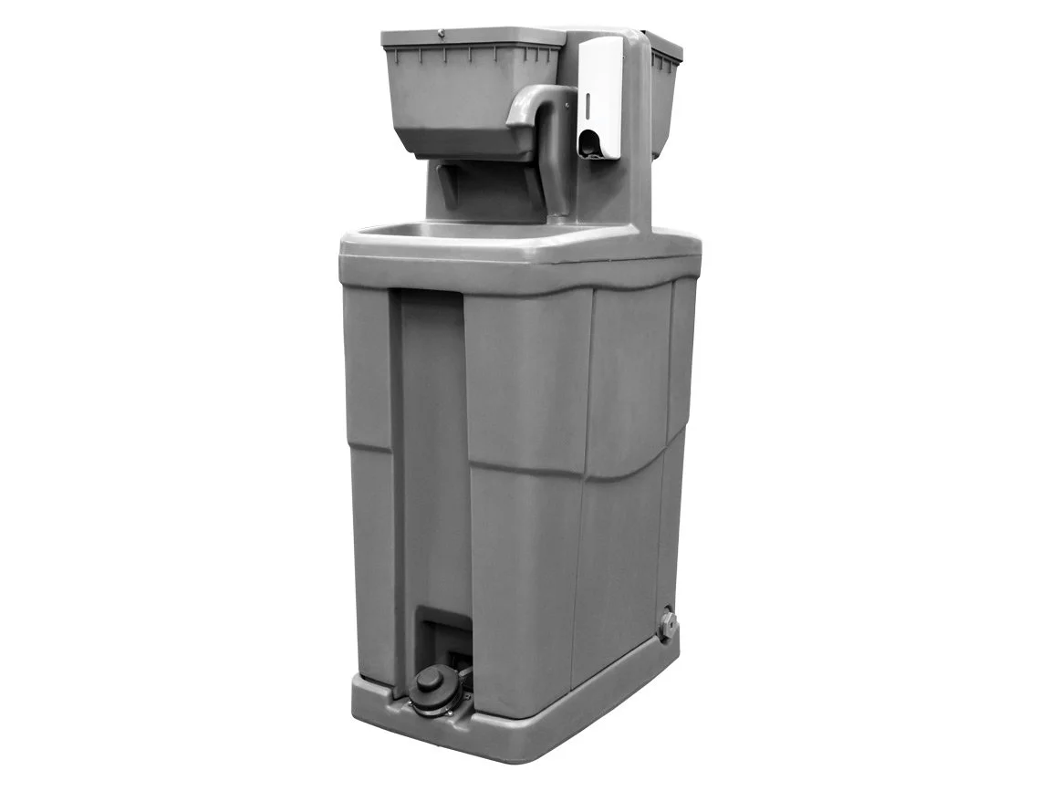 A gray water fountain with a built-in drinking spout and a push button for dispensing water.
