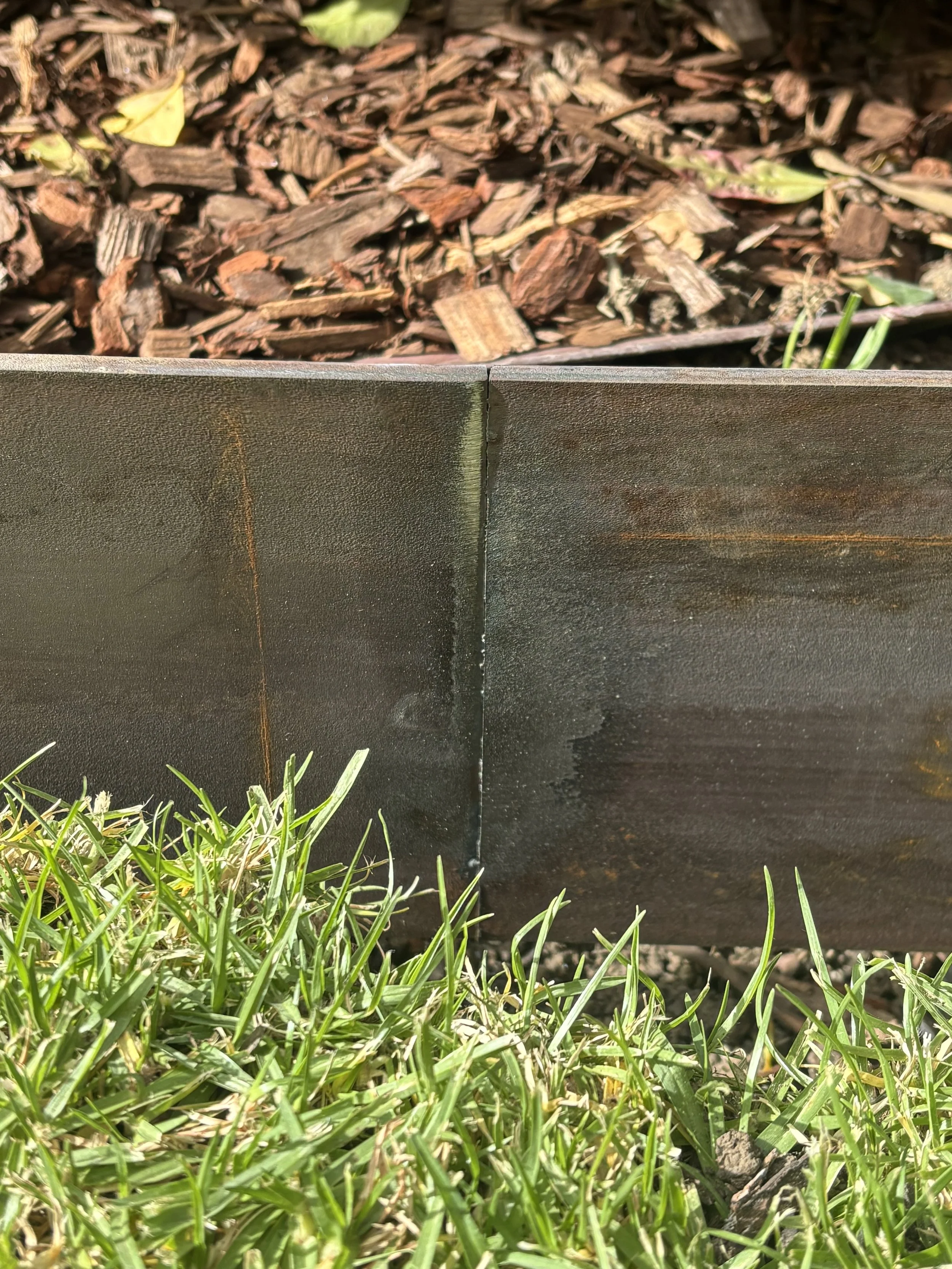 Close-up of the joint between two metal panels