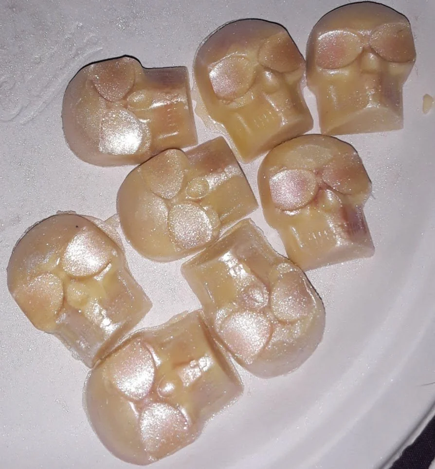 Nine white chocolate skulls