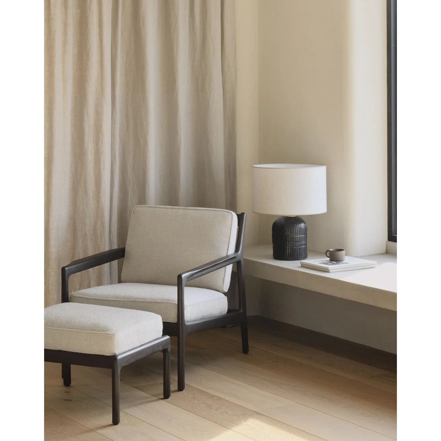 ethnicraft_35102_Jack_lounge_chair_35110_Jack_footstool_WEB.jpg