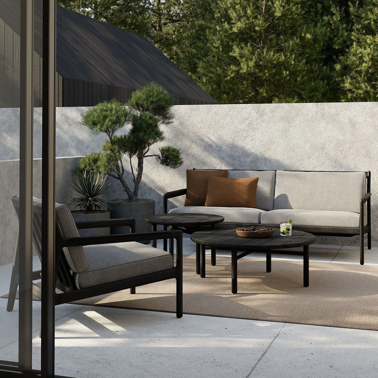 10234_Jack_outdoor_lounge_chair_10235_Jack_outdoor_sofa_10267_10268_Quatro_outdoor_coffee_table_21205_Nomad_indoor_outdoor_rug_21151_21150_Nomad_outdoor_cushion_WEB.jpg