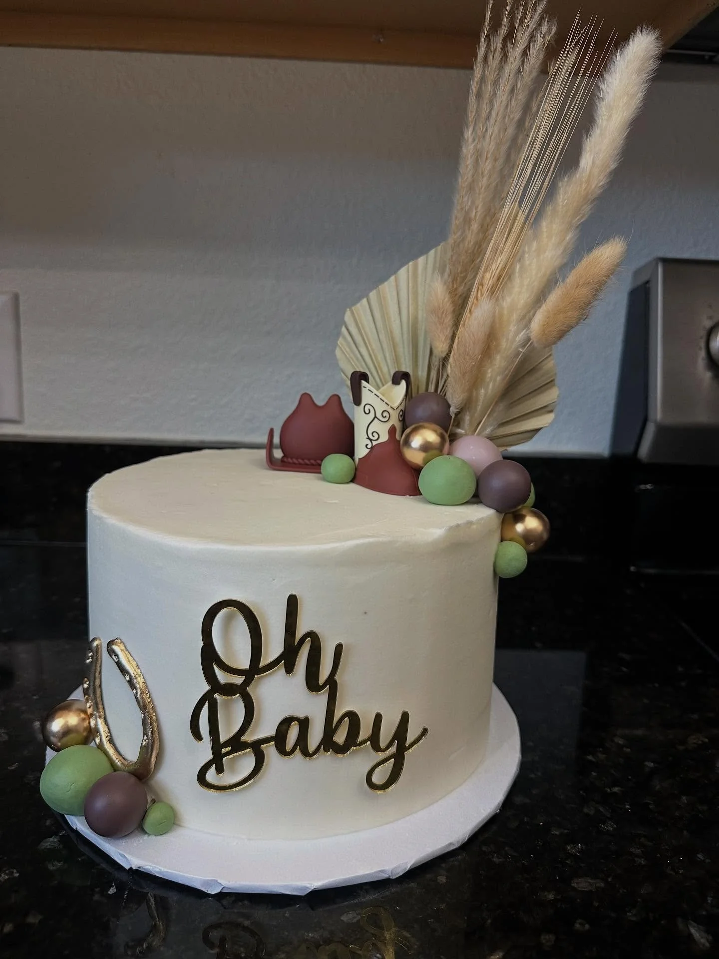 Sage western baby shower with matching cupcakes and cookies