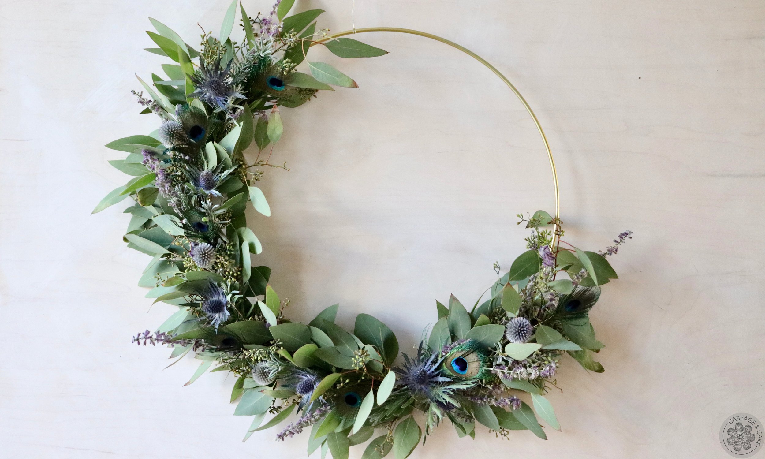 FALL WREATH WITH PEACOCK FEATHERS