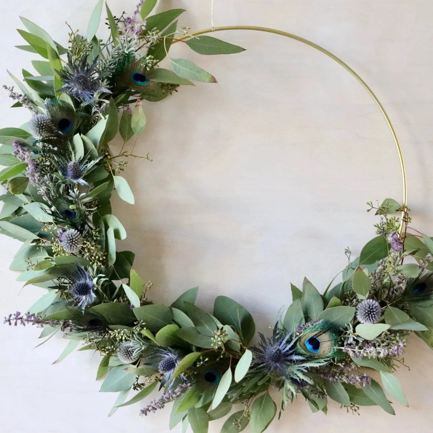 FALL WREATH WITH PEACOCK FEATHERS