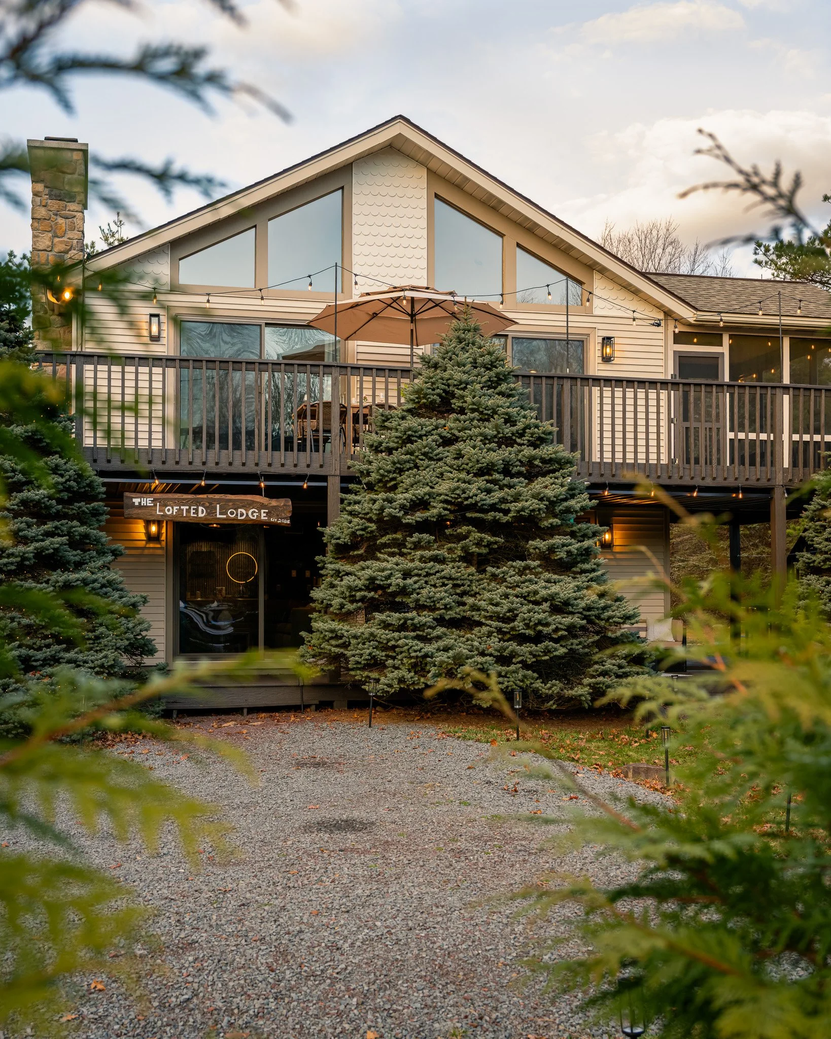 Lower deck at the lodge with shaded seating and outdoor gathering space