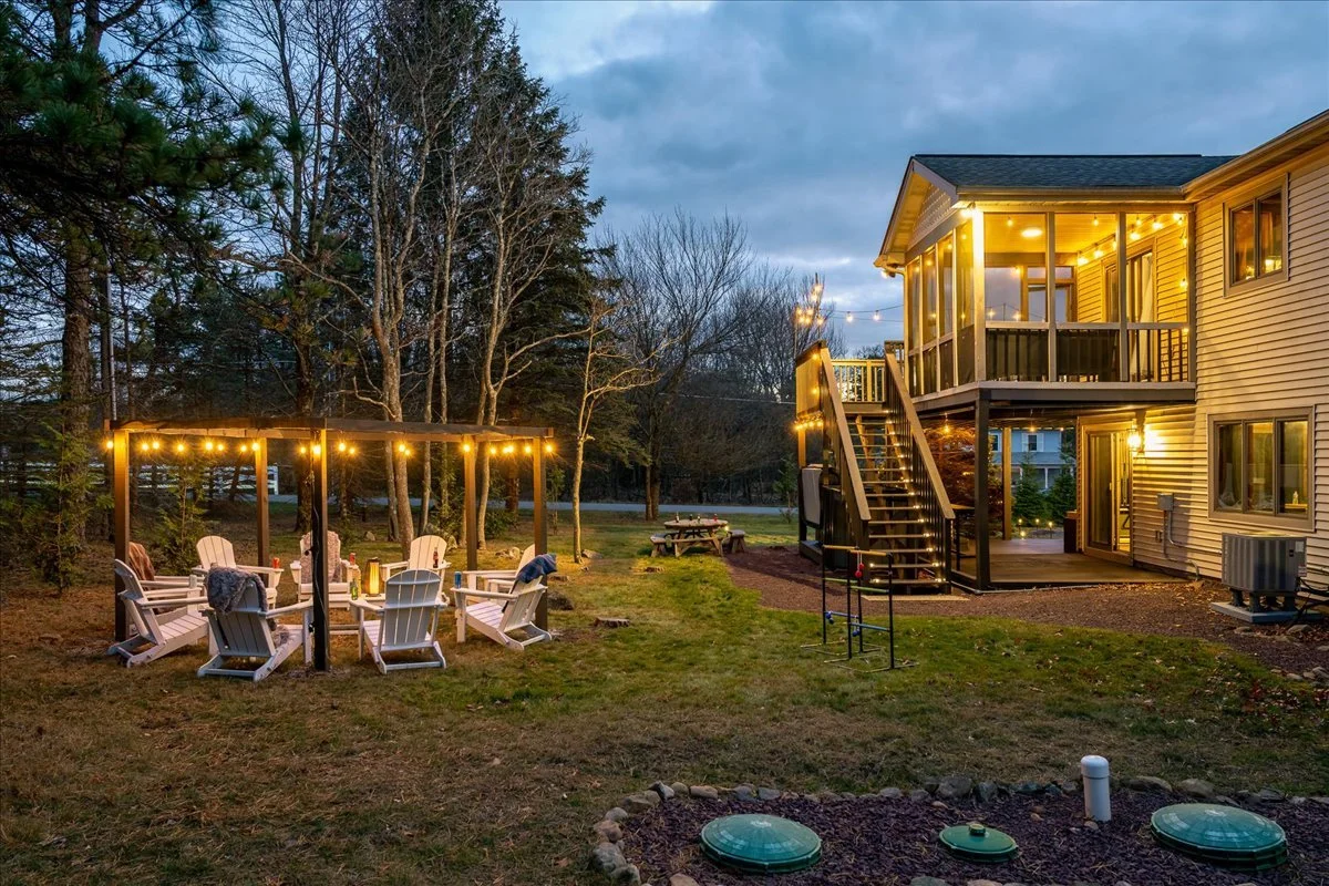 Spacious green lawn at the lodge perfect for outdoor activities and relaxation