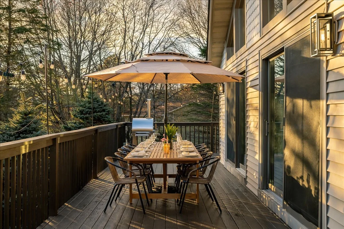 Upper deck at the lodge with scenic views and outdoor seating area