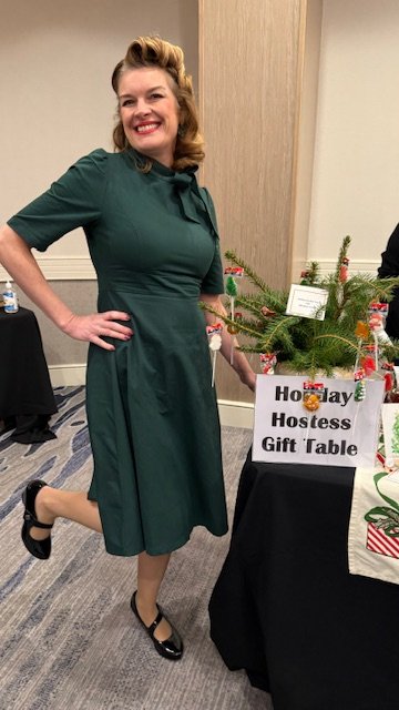 2024 Mardi Brott at the Hostess Table.jpg