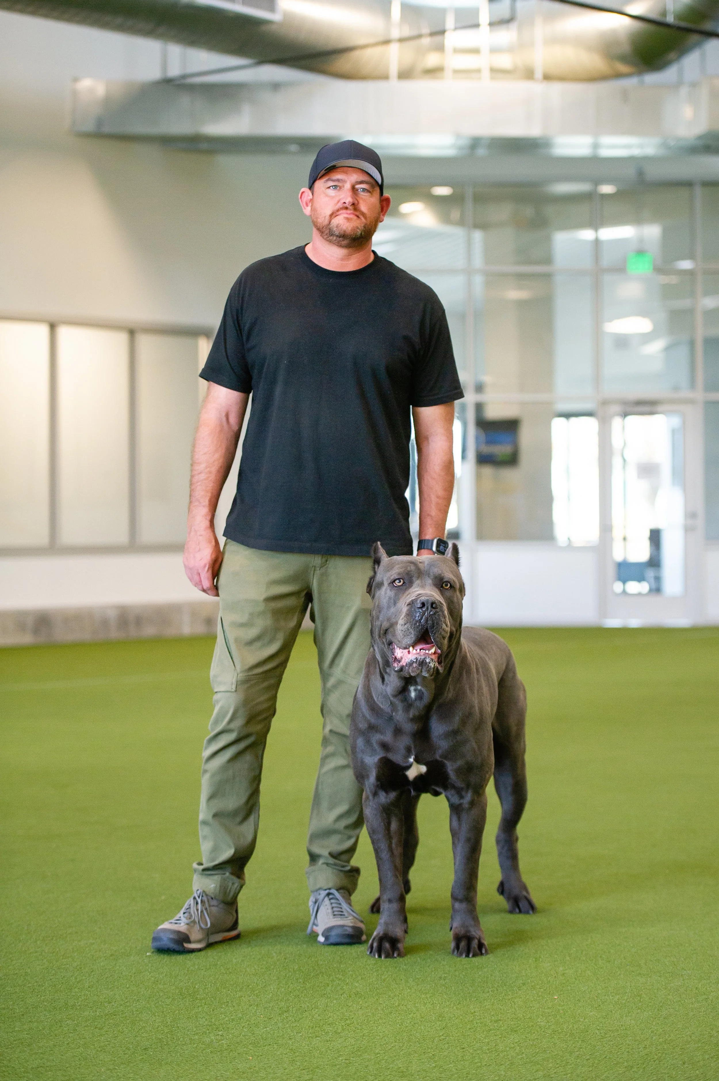 Lawren Bennett, Owner/Head Trainer with a trained personal protection Cane Corso