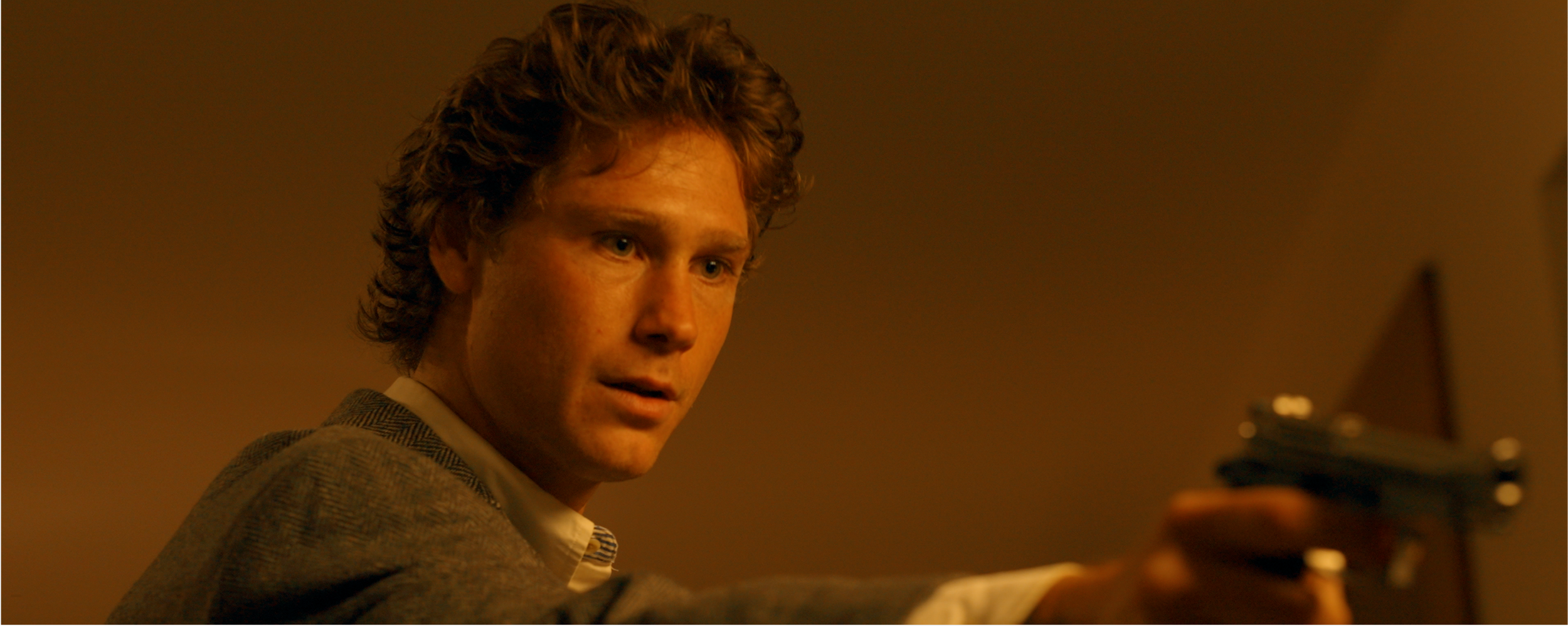 Sal threatens Renee in a suite in the Langham Hotel