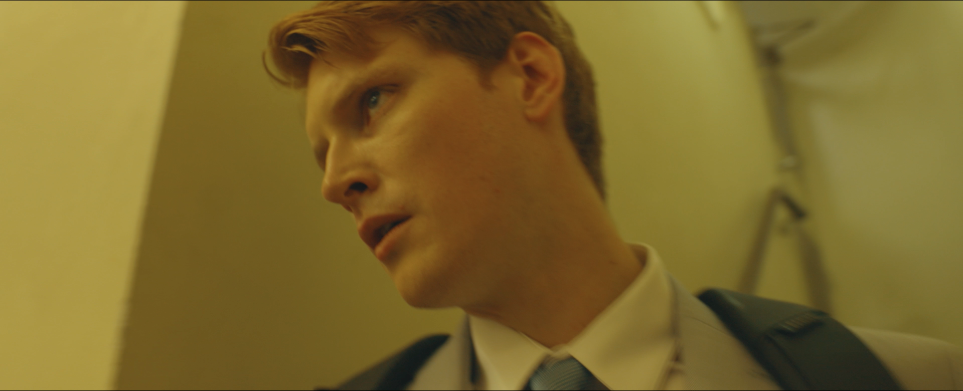 Cooper eyes the front door before his escape