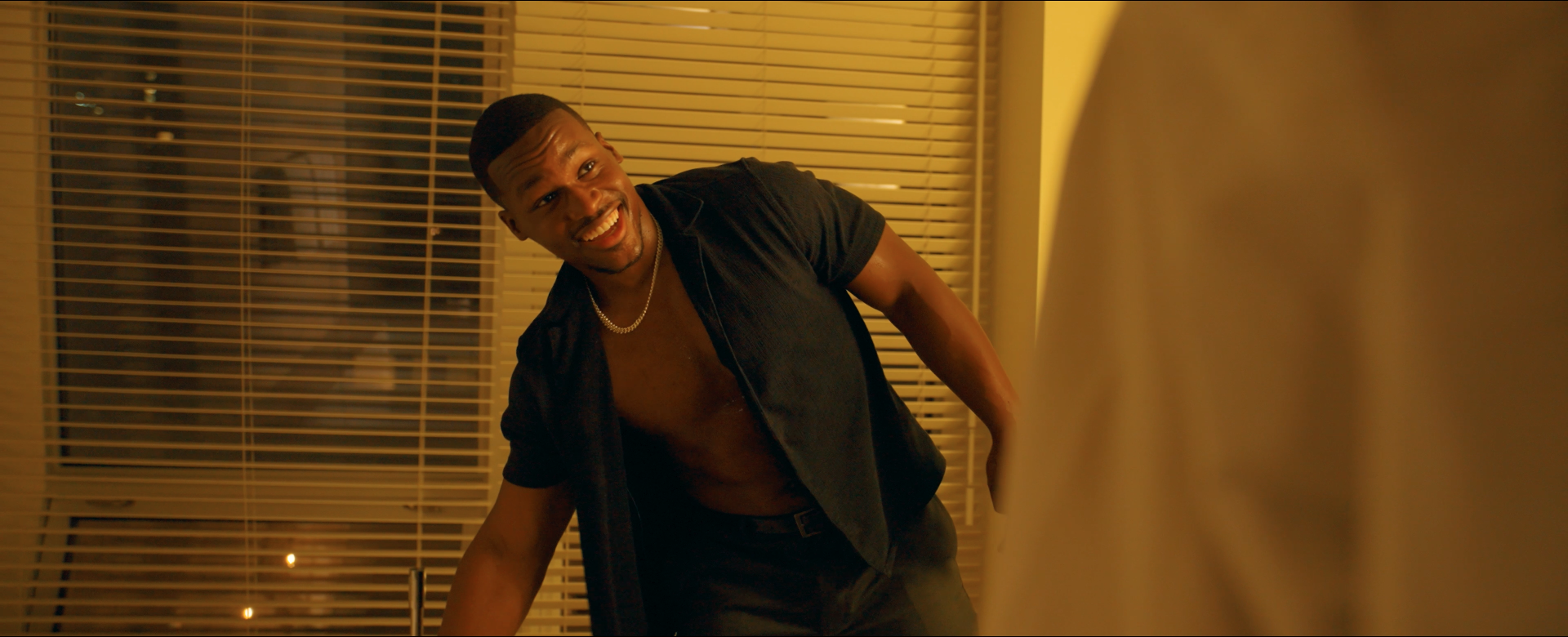 Joe greets Renee in the bathroom in the Langham Hotel suite in New York City in Another Day in New York