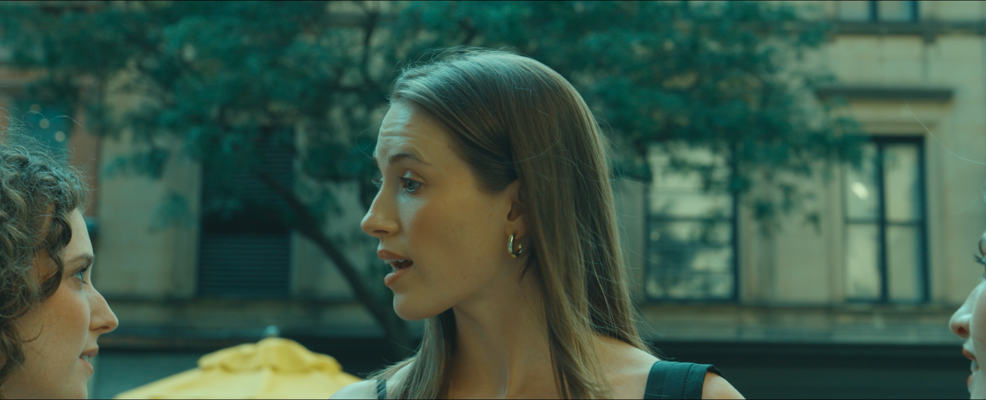 Carol, Joanne, and Maggie have a conversation in the Flatiron district in New York City